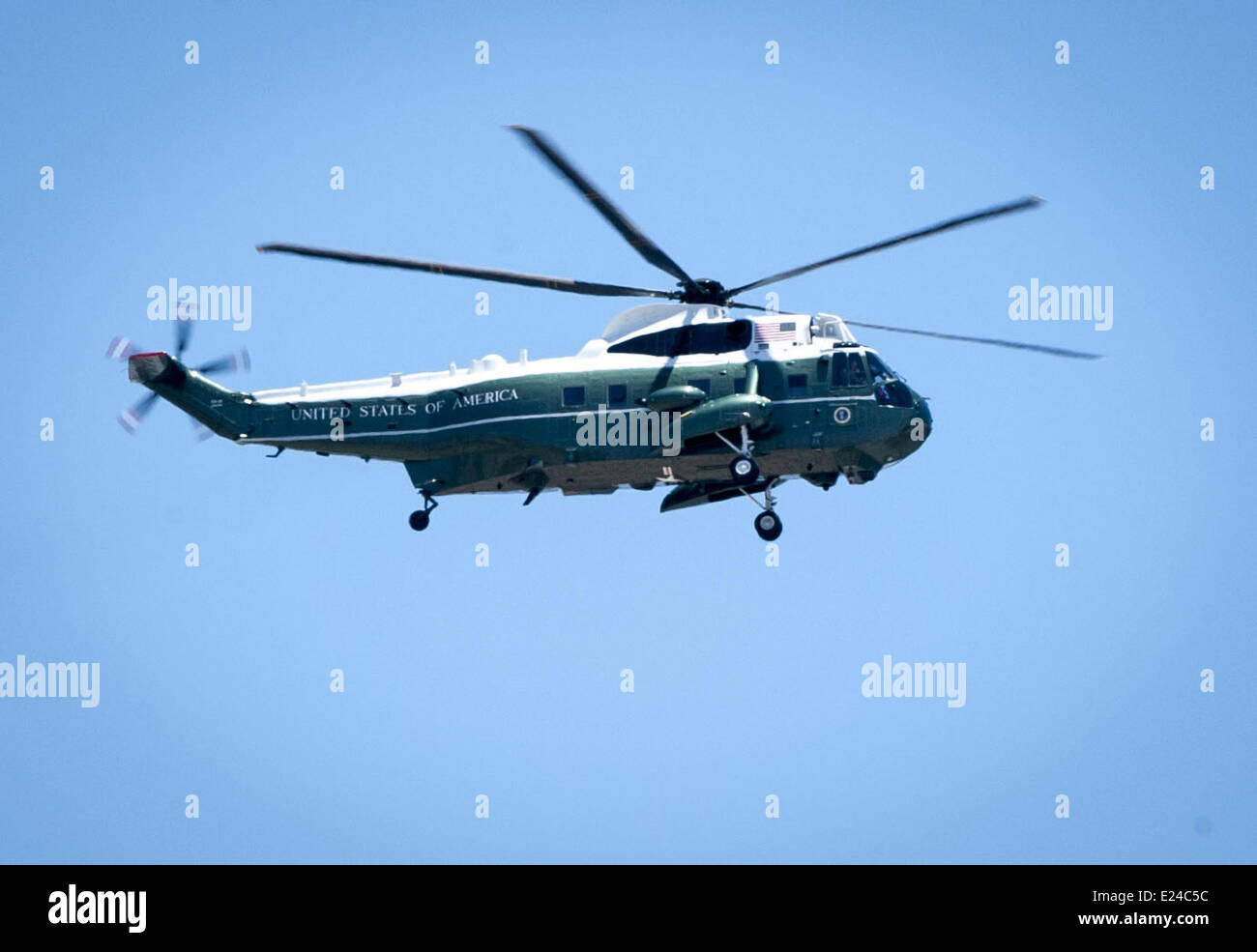 Anaheim, California, USA. 13th June, 2014. A Sikorsky SH-3 Sea King Helicopter designated as Marine One with US President Obama as passenger, flies over Angel Stadium in Anaheim, California, on June 14, 2014. President Obama had earlier delivered a commencement speech for the graduating class from the University of California at Irvine, Class of 2014. © David Bro/ZUMAPRESS.com/Alamy Live News Stock Photo