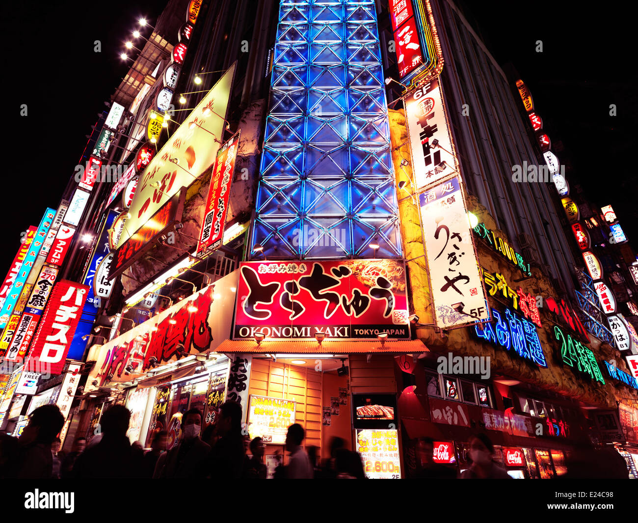 Colorful signs on streets at night in Shinjuku, Tokyo, Japan. Stock Photo