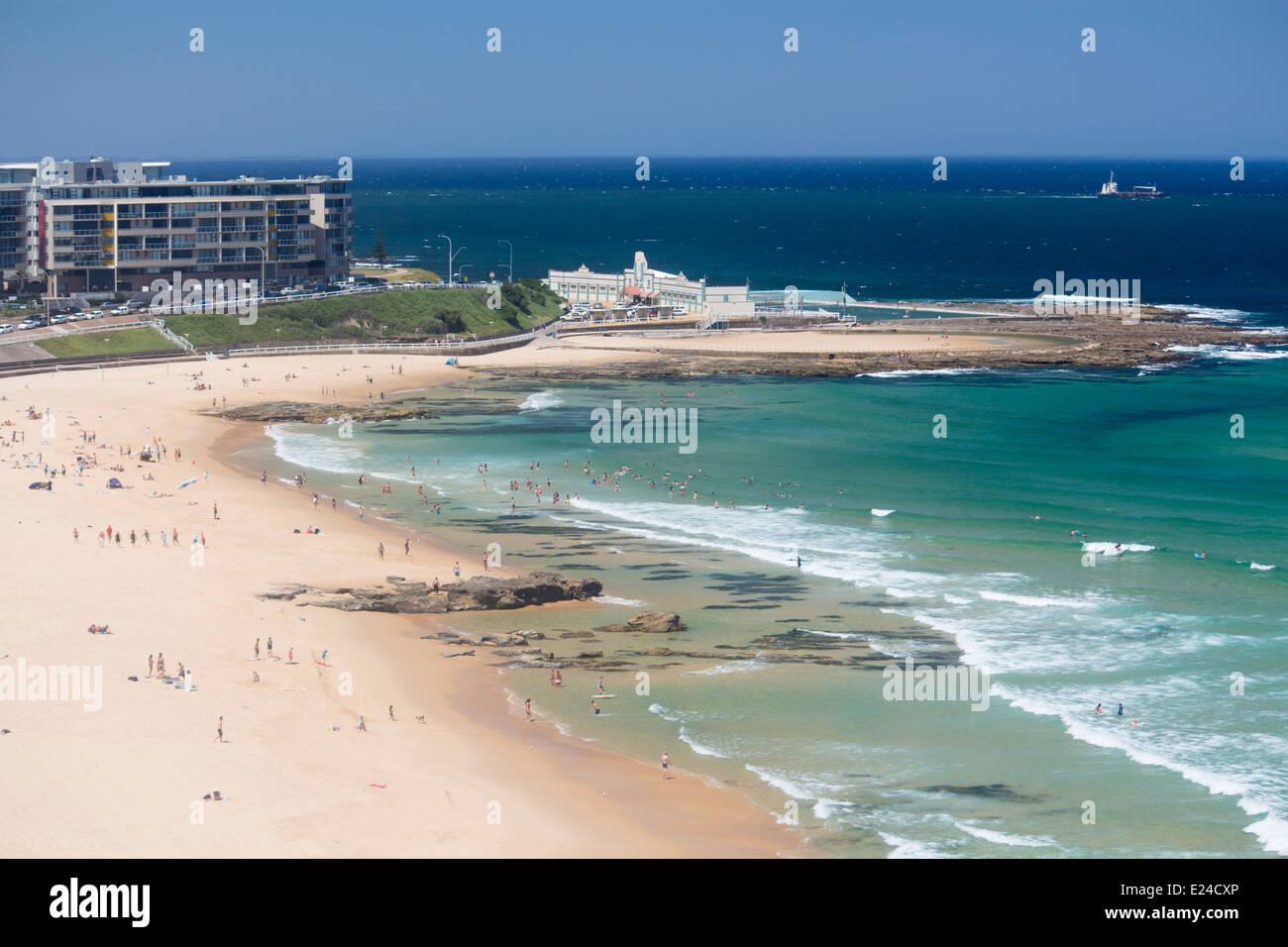 Newcastle Beach wide view with Ocean Baths behind Newcastle New South Wales NSW Australia Stock