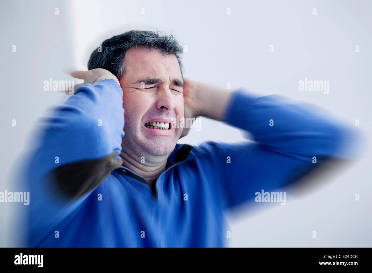 Ear pain in a man Stock Photo Alamy