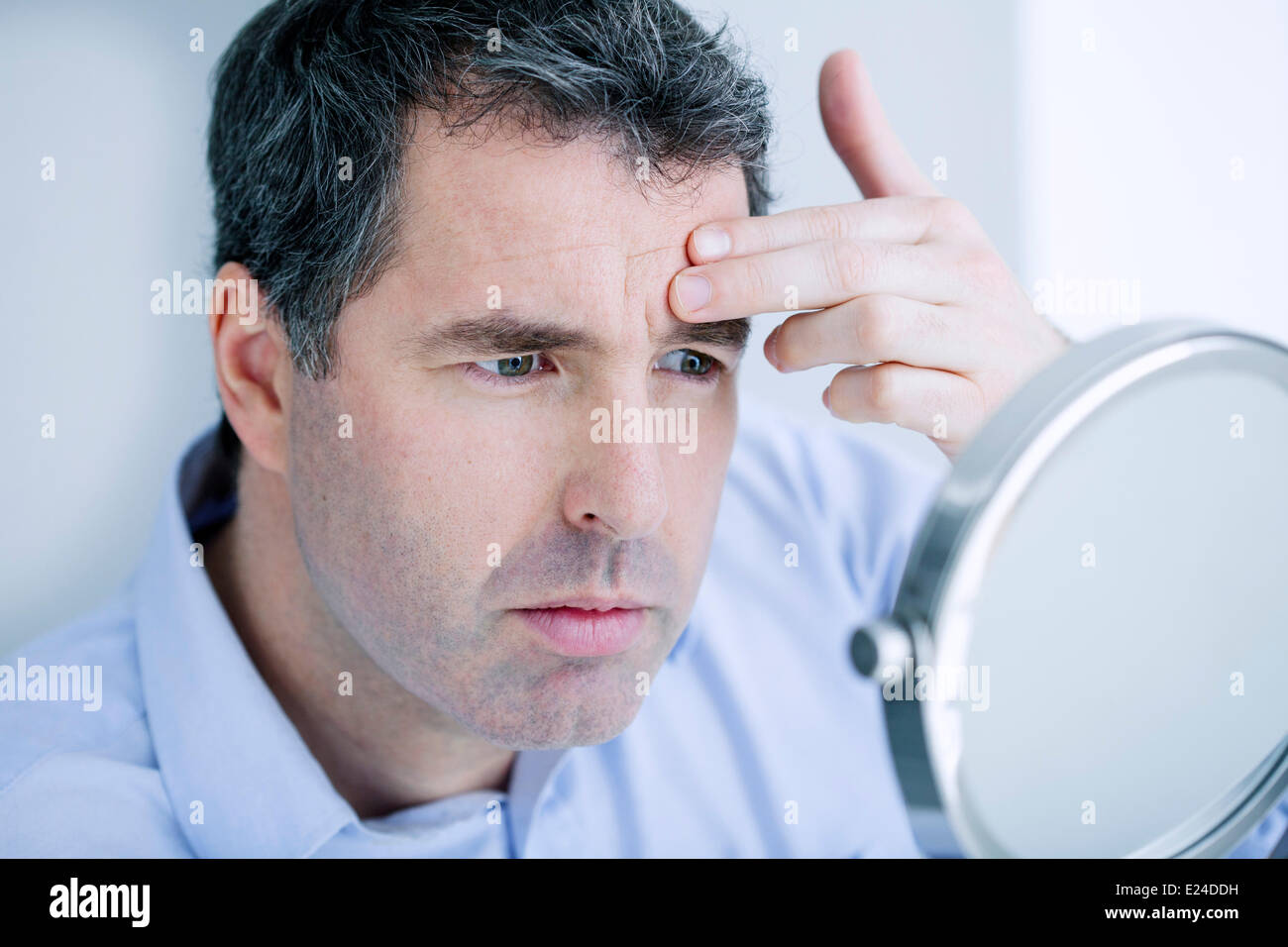 Man with mirror Stock Photo Alamy