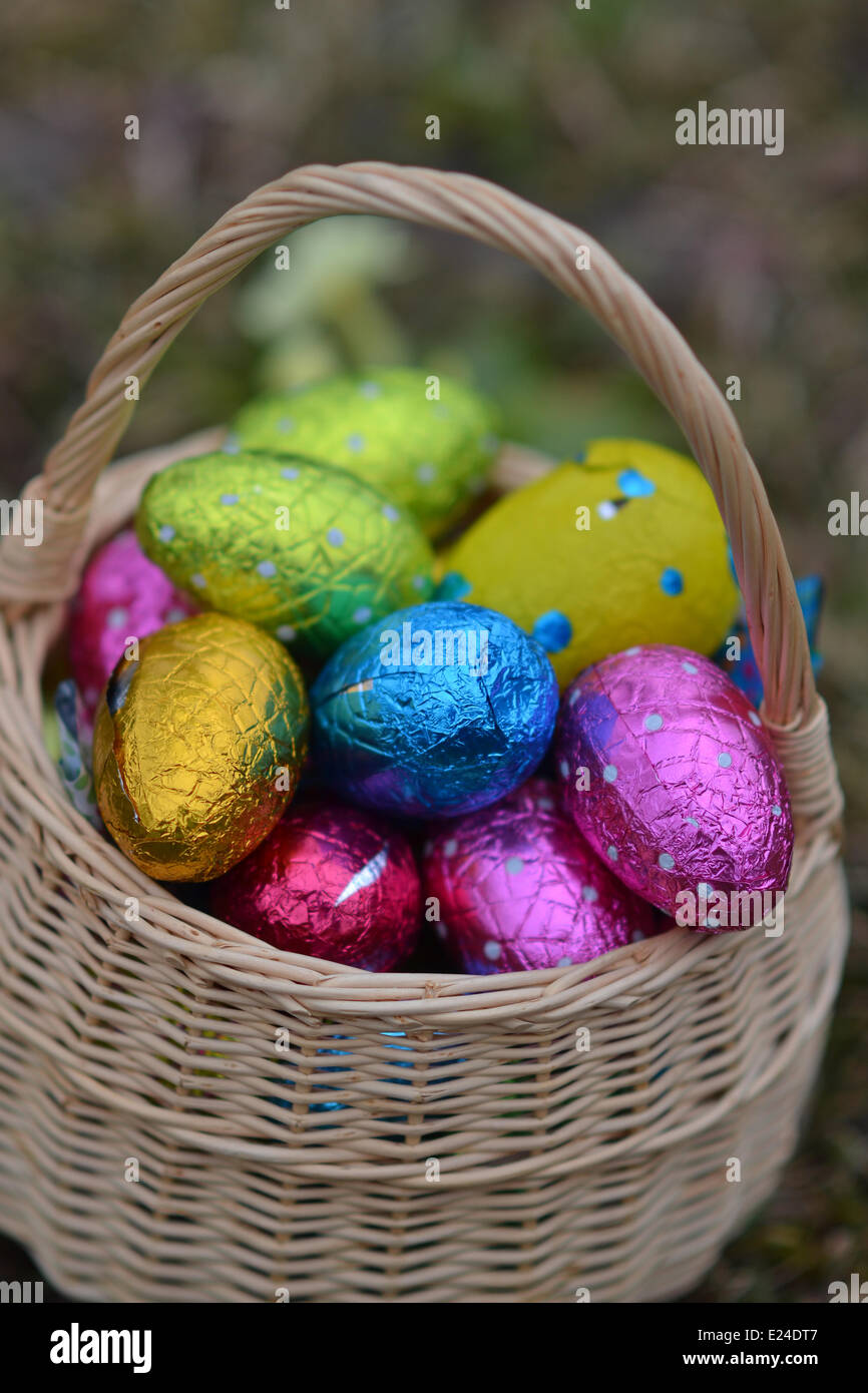 Colourful easter eggs in a basket. Stock Photo