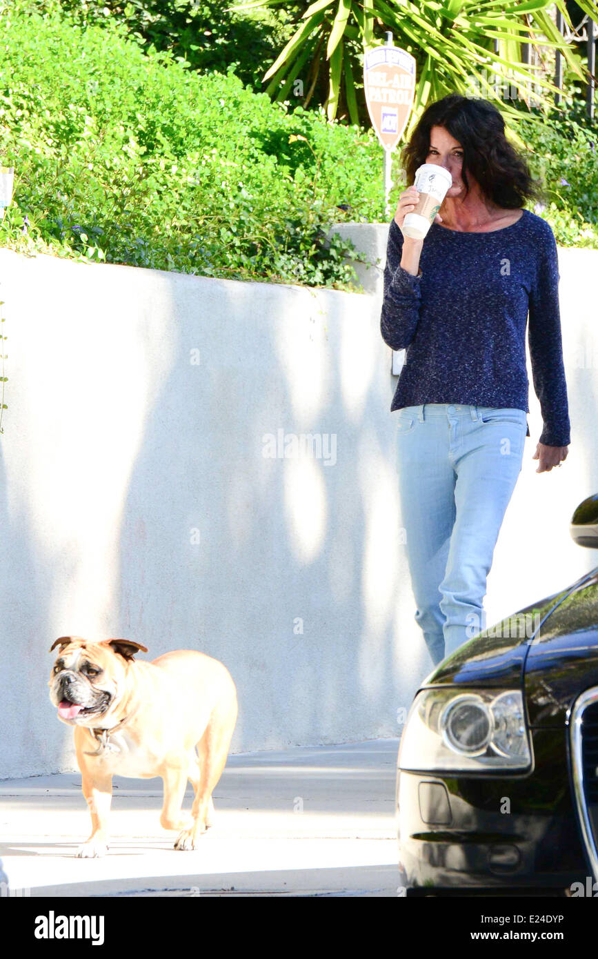 Janice Dickinson drinking coffee whilst running errands and walking her dog. Studio City, California - 11.02.2013  Where: Studio City, California, United States When: 11 Feb 2013 Stock Photo