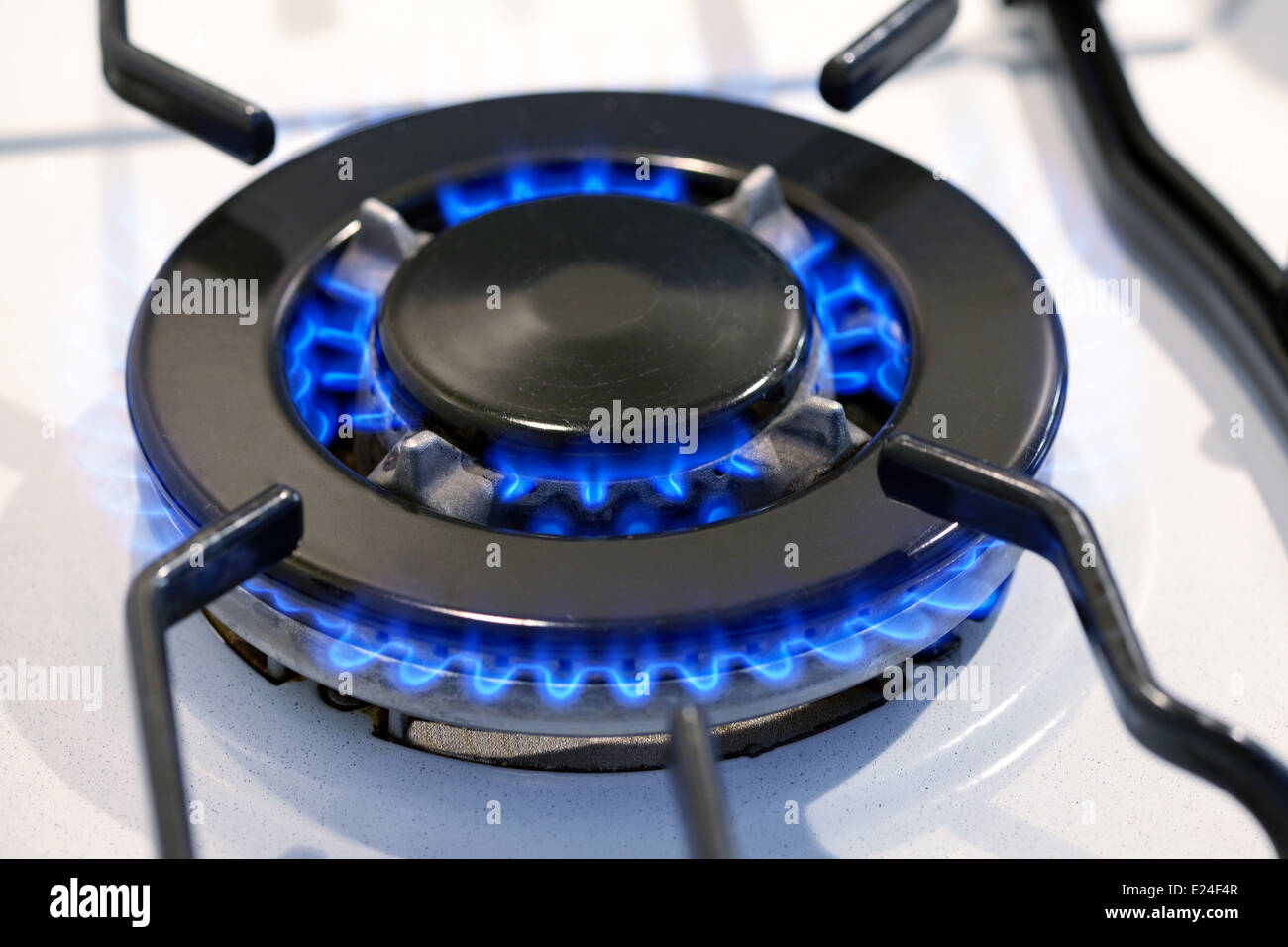 Burning gas ring on a domestic stove Stock Photo