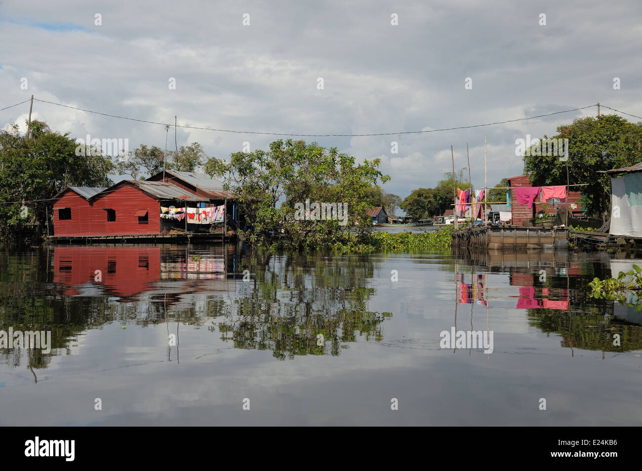 Red floating house on the Tonle Sap Lake Stock Photo