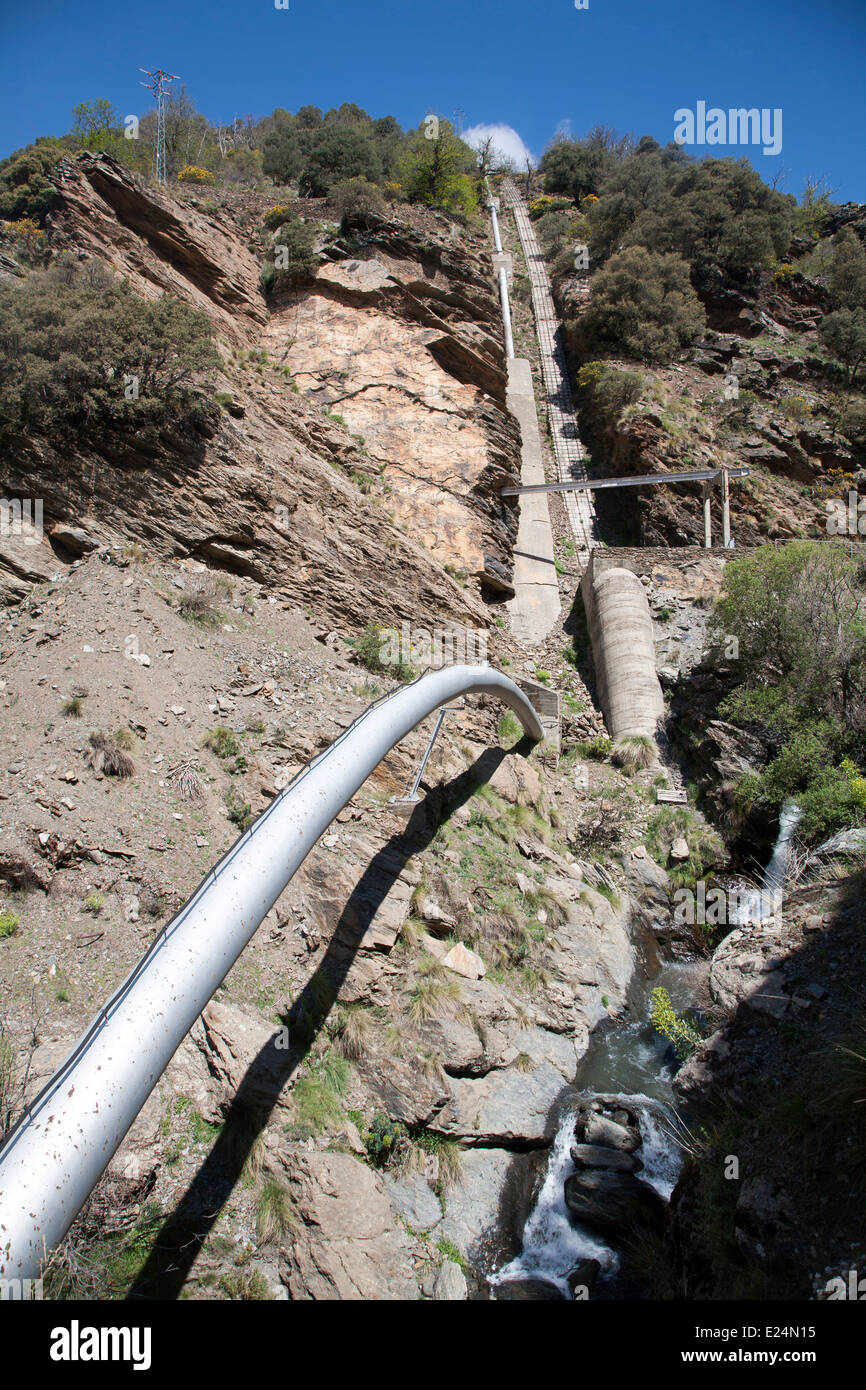 Pipeline for HEP electricity generation River Rio Poqueira gorge valley, High Alpujarras, Sierra Nevada, Granada Province, Spain Stock Photo