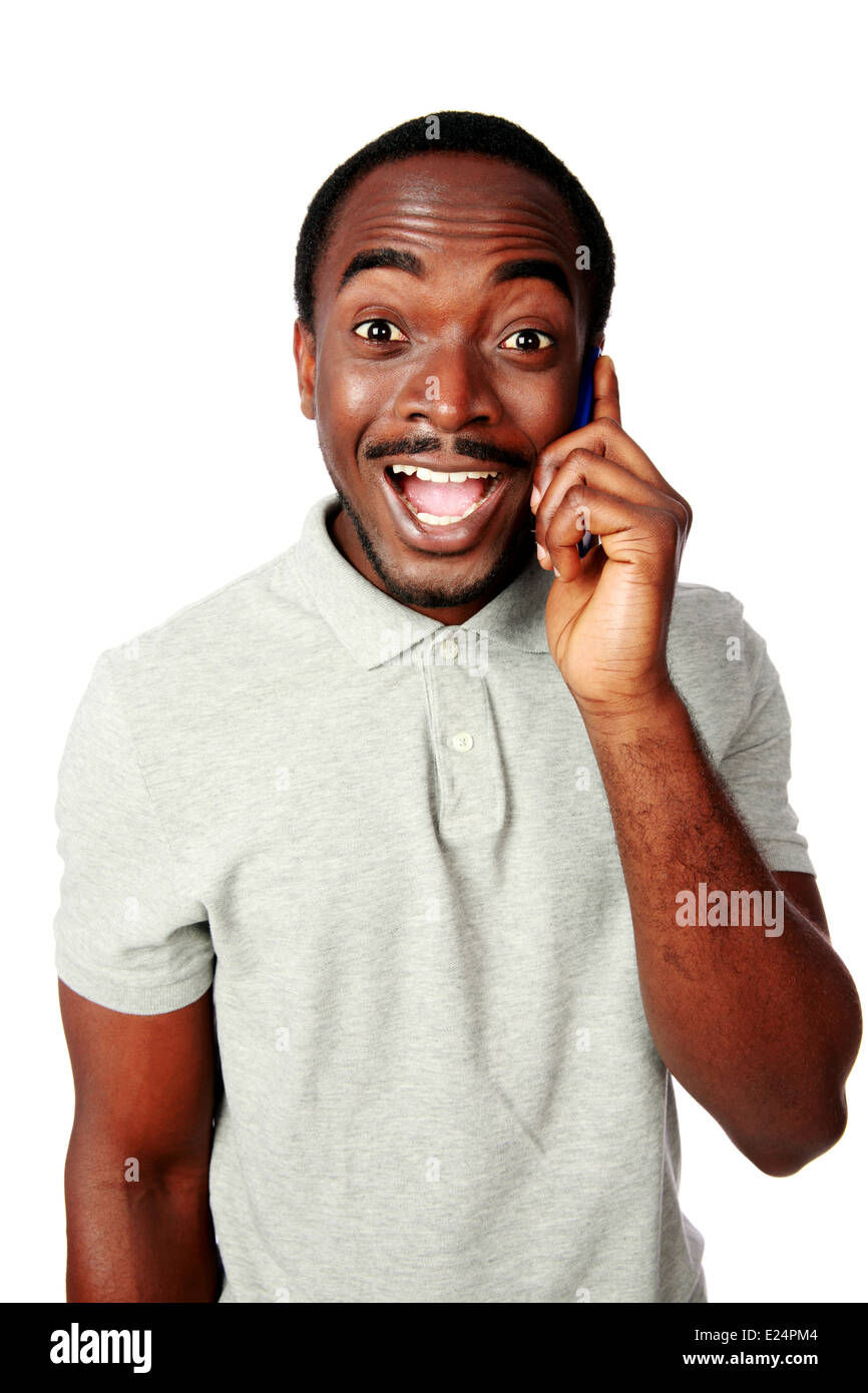 Funny african man talking on the phone isolated on a white background Stock Photo - Alamy Funny african man talking on the phone isolated on a white background Stock Photo - Alamy
