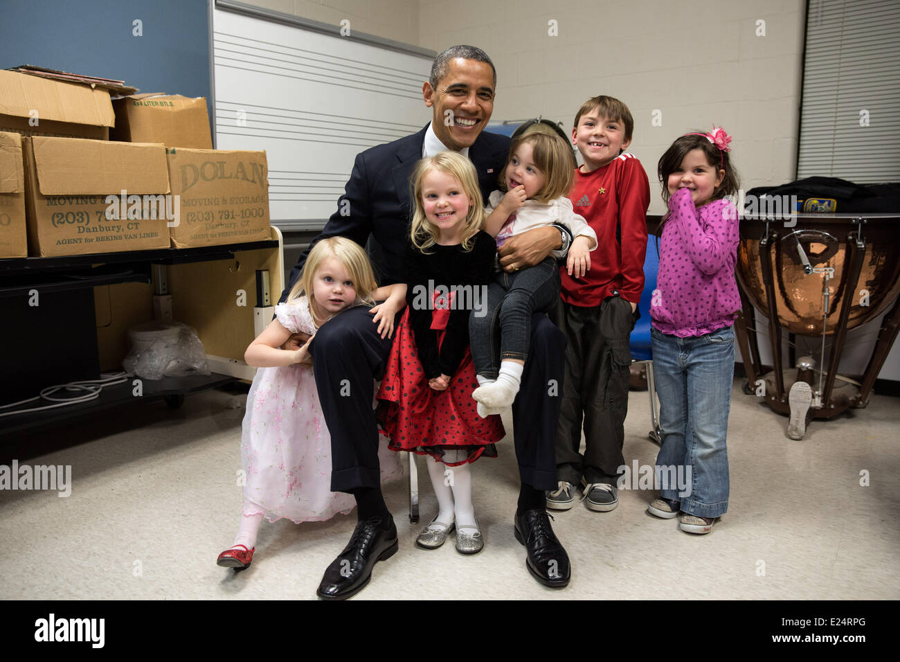 U.S. President Barack Obama meets survivors of the school shooting in Newtown, Connecticut, as well as victims' families. Six staff members and twenty young pupils were killed in the massacre on 14 December, 2012.  Featuring: President Barack Obama Where: Newtown, Connecticut, United States When: 16 Dec 2012 Stock Photo