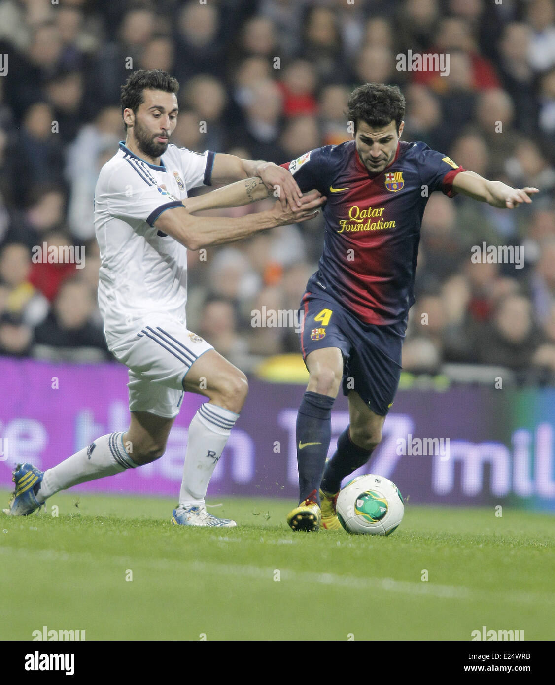 Real Madrid welcome Barcelona FC to the Santiago Bernabeu stadium in the Copa del Rey Semi-Final 1st leg. The match finished 1-1.  Featuring: Alvaro Arbeloa,Cesc Fabregas Where: Madrid, Spain When: 30 Jan 2013 Stock Photo