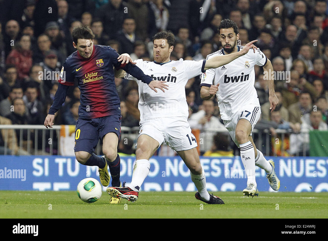 Real Madrid welcome Barcelona FC to the Santiago Bernabeu stadium in the Copa del Rey Semi-Final 1st leg. The match finished 1-1.  Featuring: Lionel Messi,Xabi Alonso,Alvaro Arbeloa Where: Madrid, Spain When: 30 Jan 2013 Stock Photo