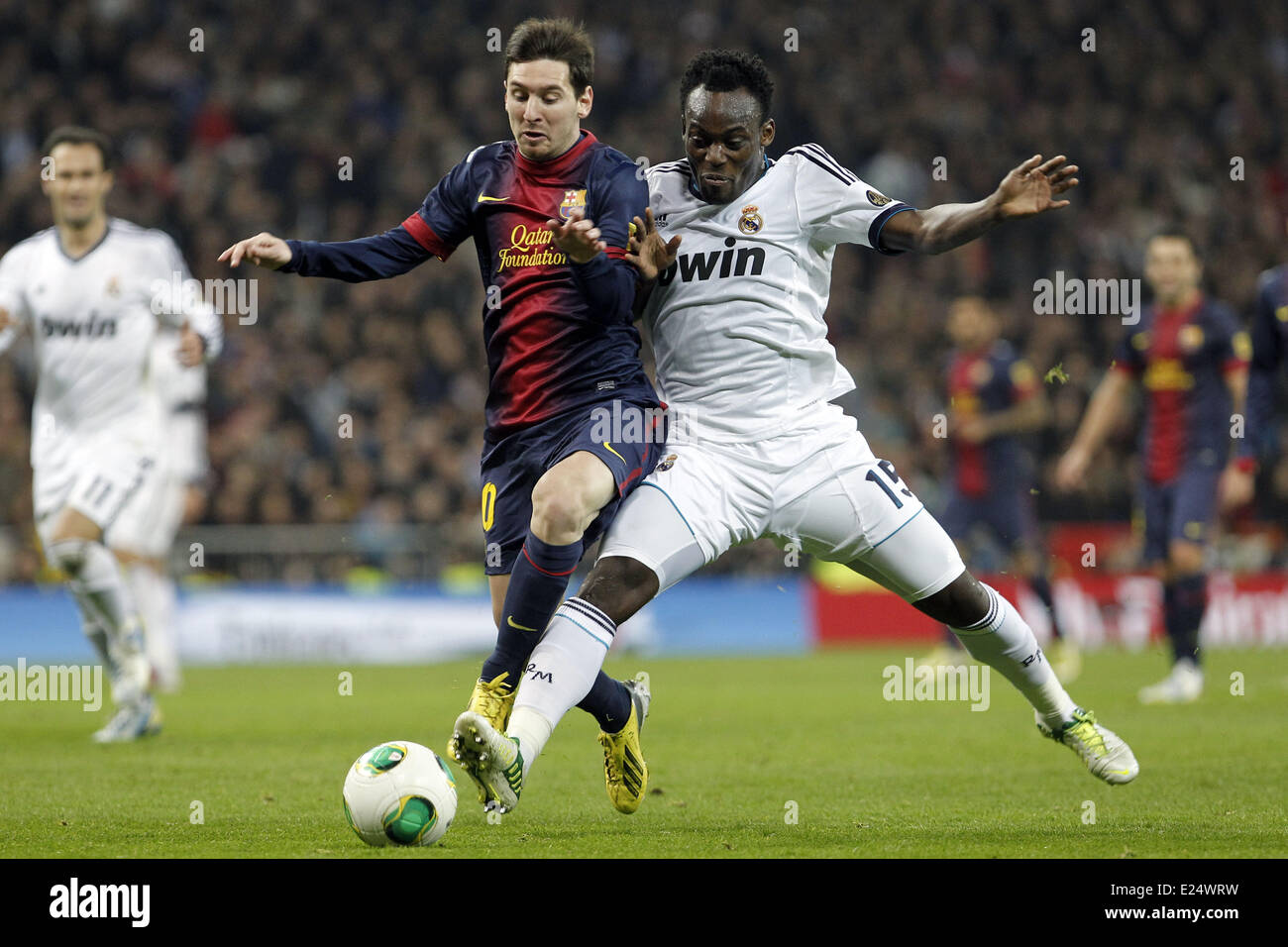 Real Madrid welcome Barcelona FC to the Santiago Bernabeu stadium in the Copa del Rey Semi-Final 1st leg. The match finished 1-1.  Featuring: Lionel Messi,Michael Essien Where: Madrid, Spain When: 30 Jan 2013 Stock Photo