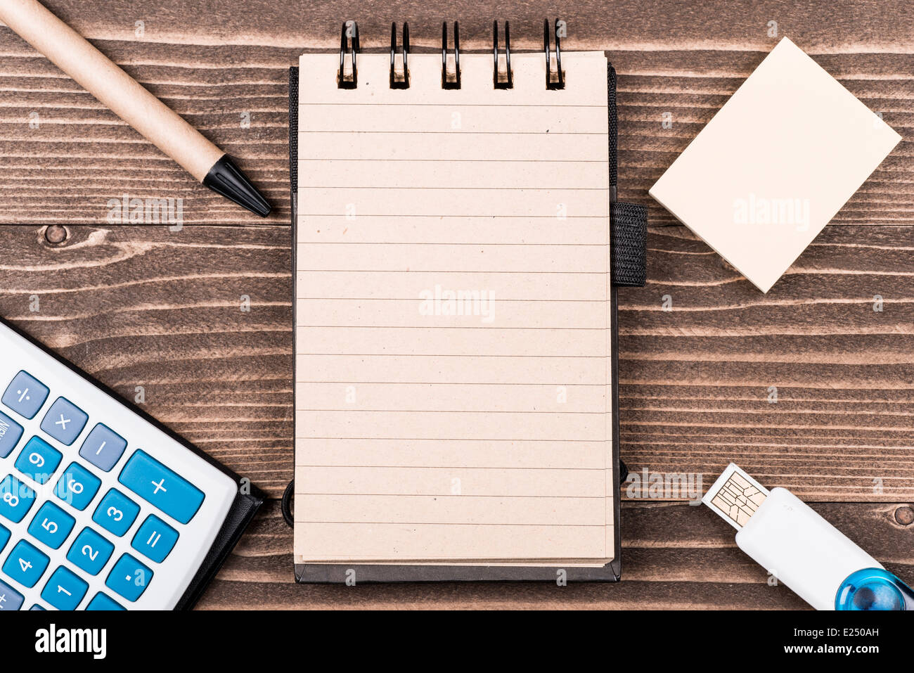 Office materials on wooden table. Top view Stock Photo - Alamy