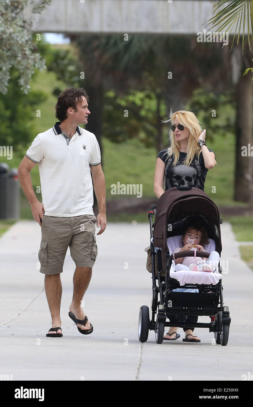 Former tennis star Carlos Moya spends the day with his family while on holiday  Featuring: Carlos Moya,Carolina Cerezuela,Carla Moya,Carlos Moya Jr. Where: Miami, Florida, United States When: 19 Feb 2013 Stock Photo