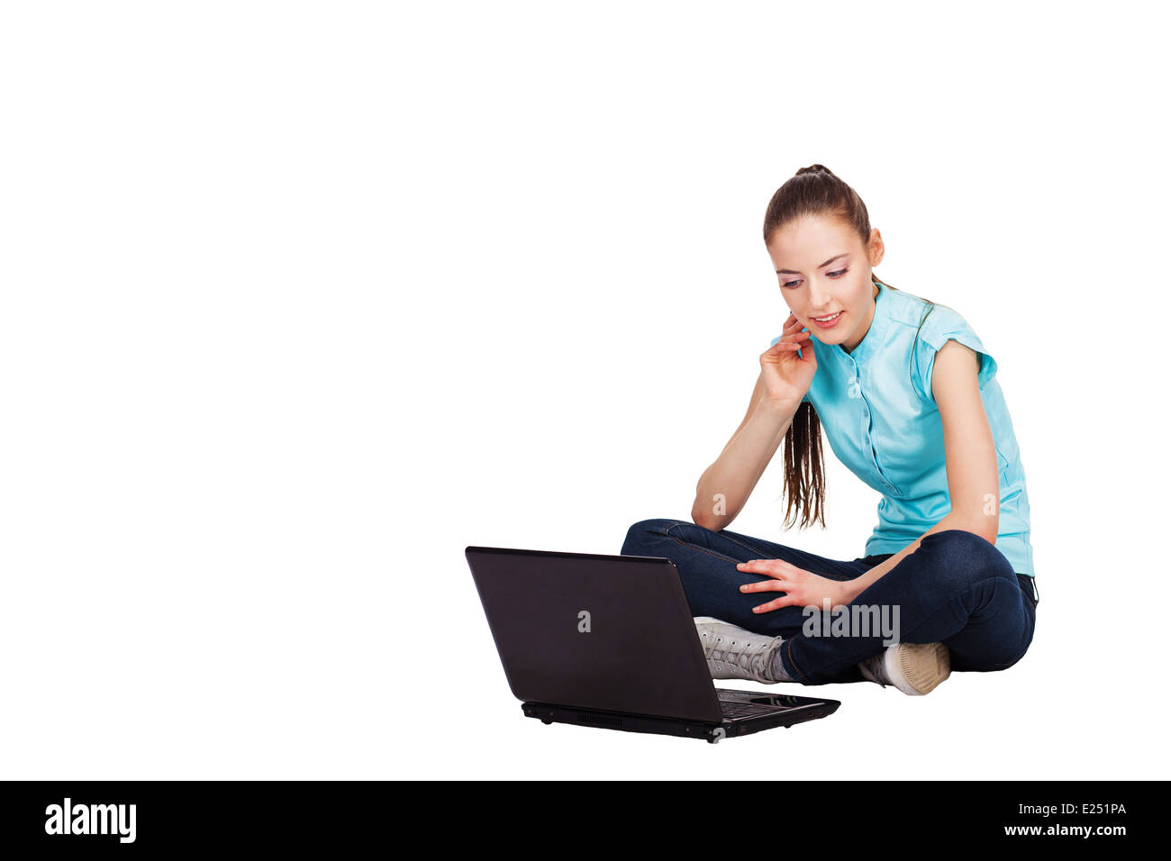 Student with laptop computer. Isolated on white background. Stock Photo