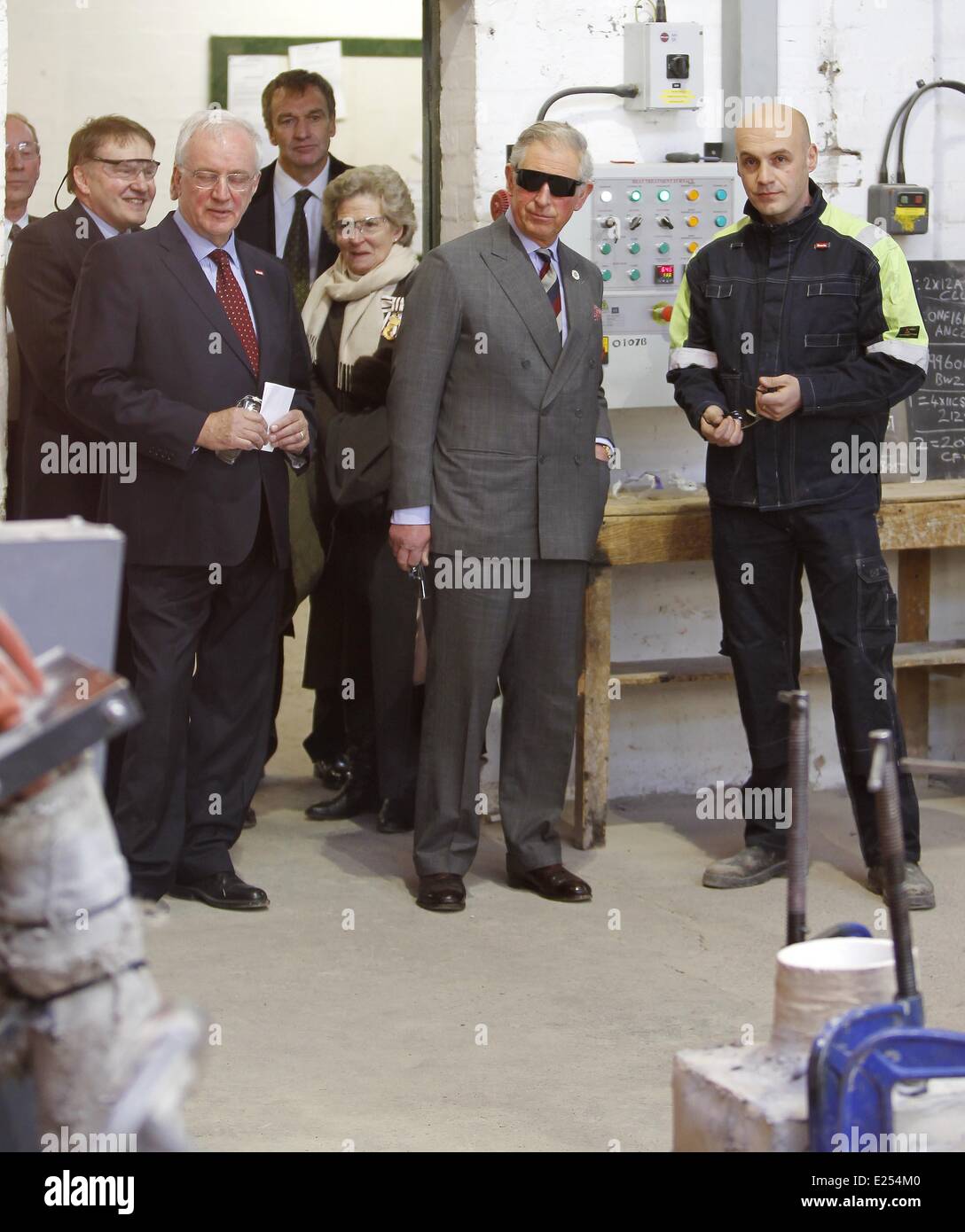 The Prince of Wales watches molten steel poured into a mold during a visit to Bonds Precision Castings, Alston, Cumbria.  Featuring: Prince Charles Where: Cumbria, United Kingdom When: 28 Mar 2013 Stock Photo