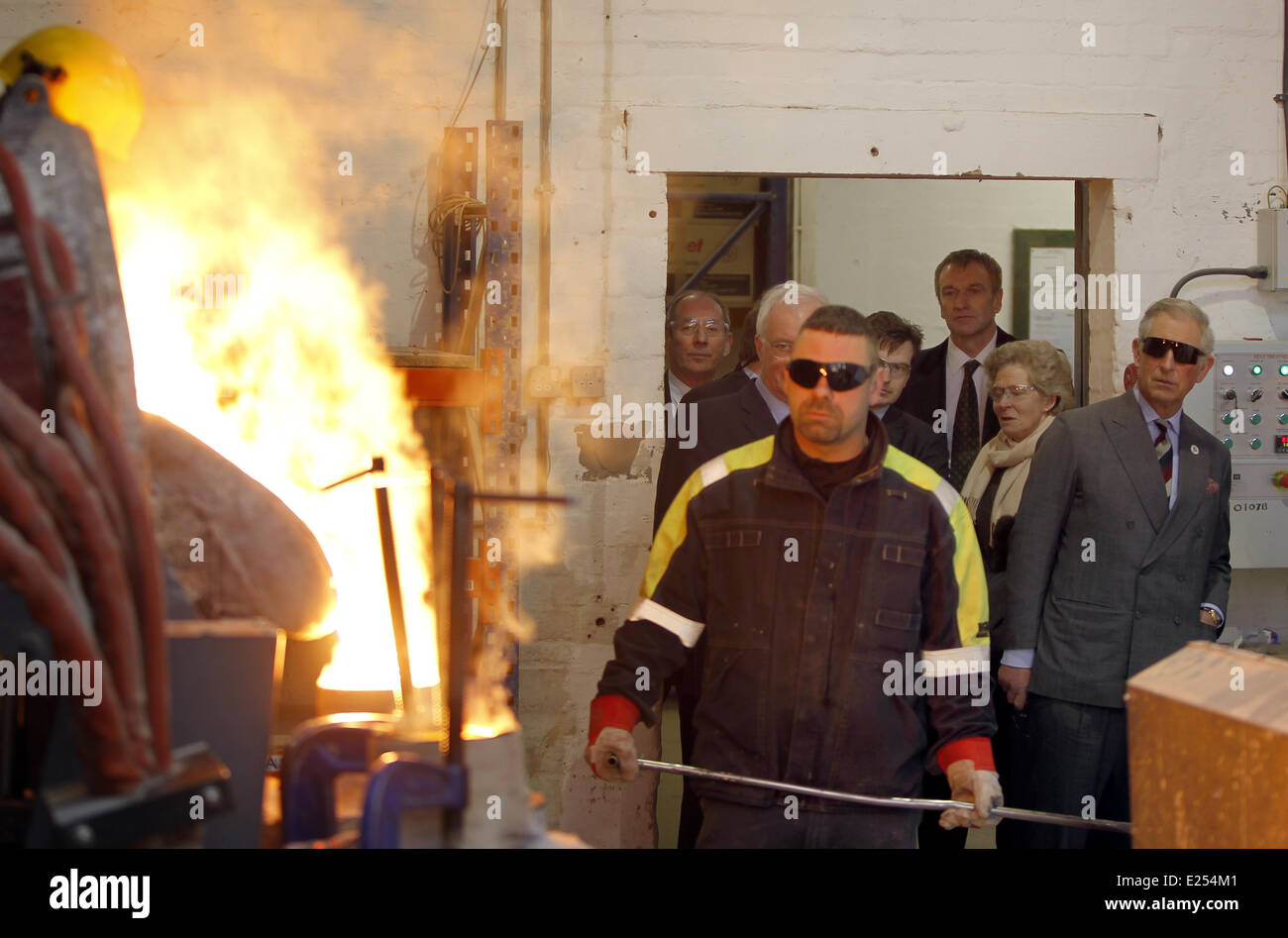 The Prince of Wales watches molten steel poured into a mold during a visit to Bonds Precision Castings, Alston, Cumbria.  Featuring: Prince Charles Where: Cumbria, United Kingdom When: 28 Mar 2013 Stock Photo