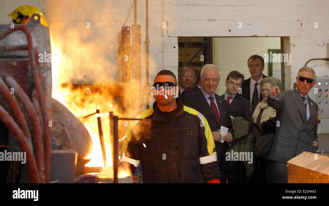 The Prince of Wales watches molten steel poured into a mold during a visit to Bonds Precision Castings, Alston, Cumbria.  Featuring: Prince Charles Where: Cumbria, United Kingdom When: 28 Mar 2013 Stock Photo