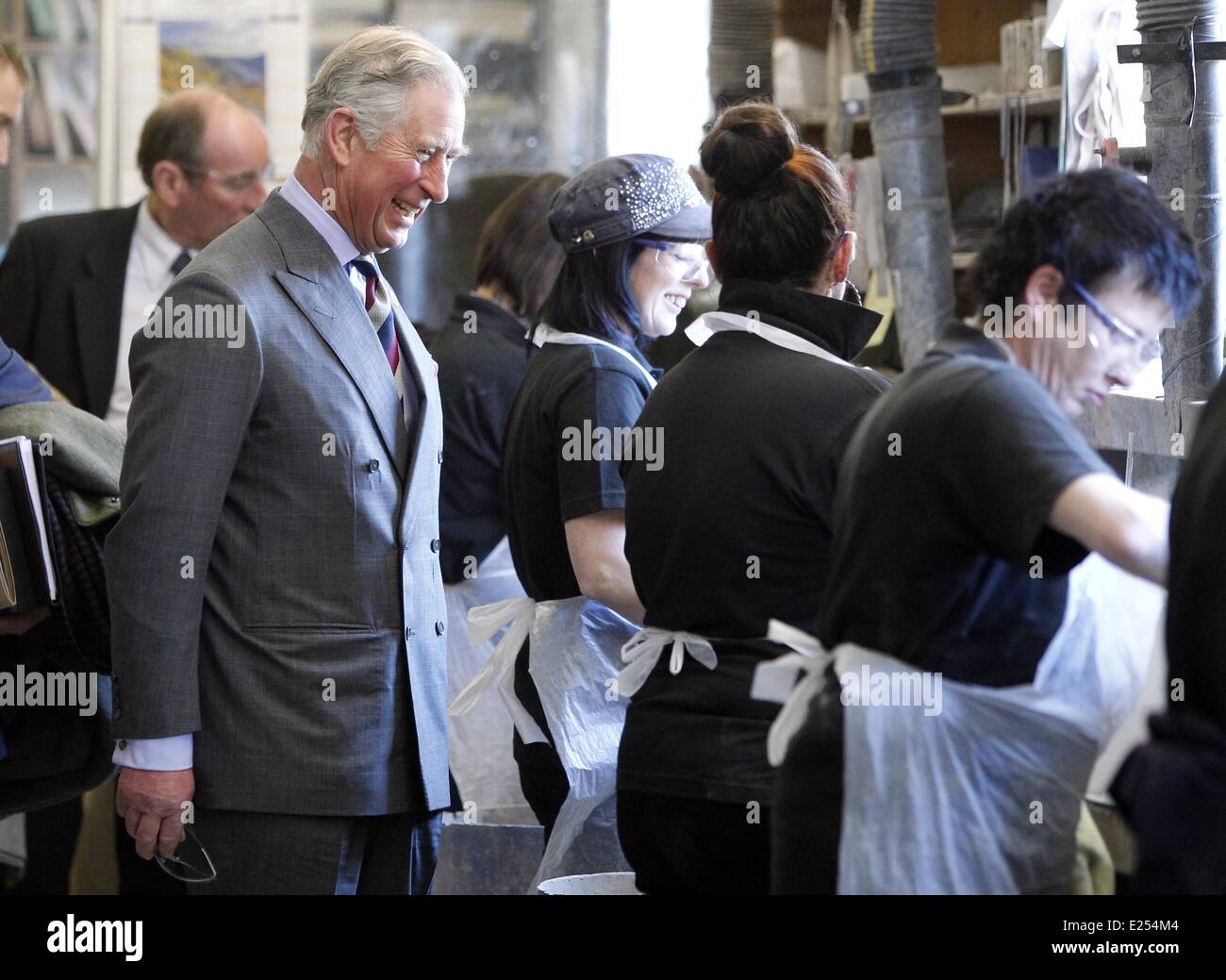 The Prince of Wales watches molds being made during a visit to Bonds Precision Castings, Alston, Cumbria.  Featuring: Prince Charles Where: Cumbria, United Kingdom When: 28 Mar 2013 Stock Photo