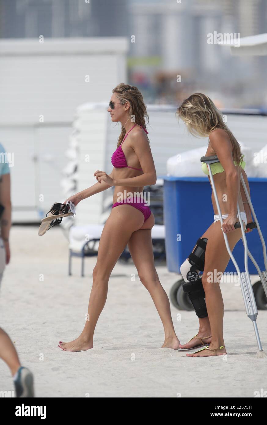 Lauren Stoner enjoys a day on Miami beach in a skimpy purple bikini  Where: Miami, Florida, United States When: 10 Jul 2013 Cred Stock Photo