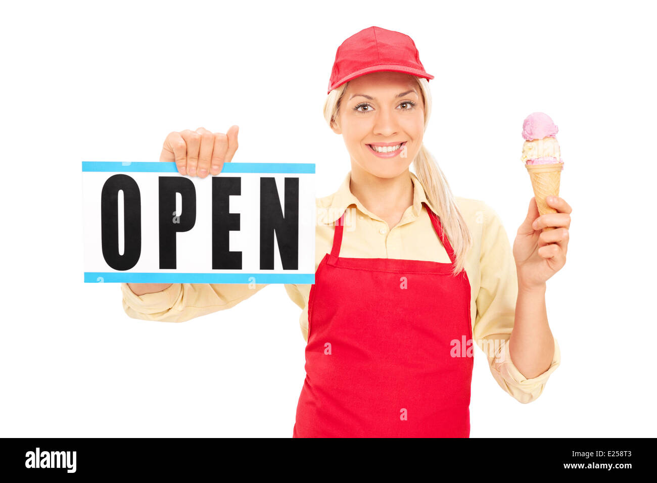 Female ice cream vendor holding an open sign Stock Photo