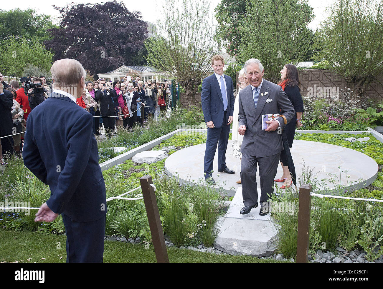 LONDON - UK - 20 MAY 2013: ROTA: Chelsea Flower Show 2013. Members of the Royal Family join HM Queen Elizabeth for a walk around the annual Chelsea Flower Show.  Prince Harry show his garden to his father Prince Charles Royal Rota photograph by Geoff Pugh/Supplied by Ian Jones Photography. NO Uk Sales for 28 days until 18-6-2013  Featuring: Charles,Prince of Wales,Prince Charles,Prince Harry,Prince Philip,Duke of Edinburgh Where: London, United Kingdom When: 20 May 2013 Stock Photo