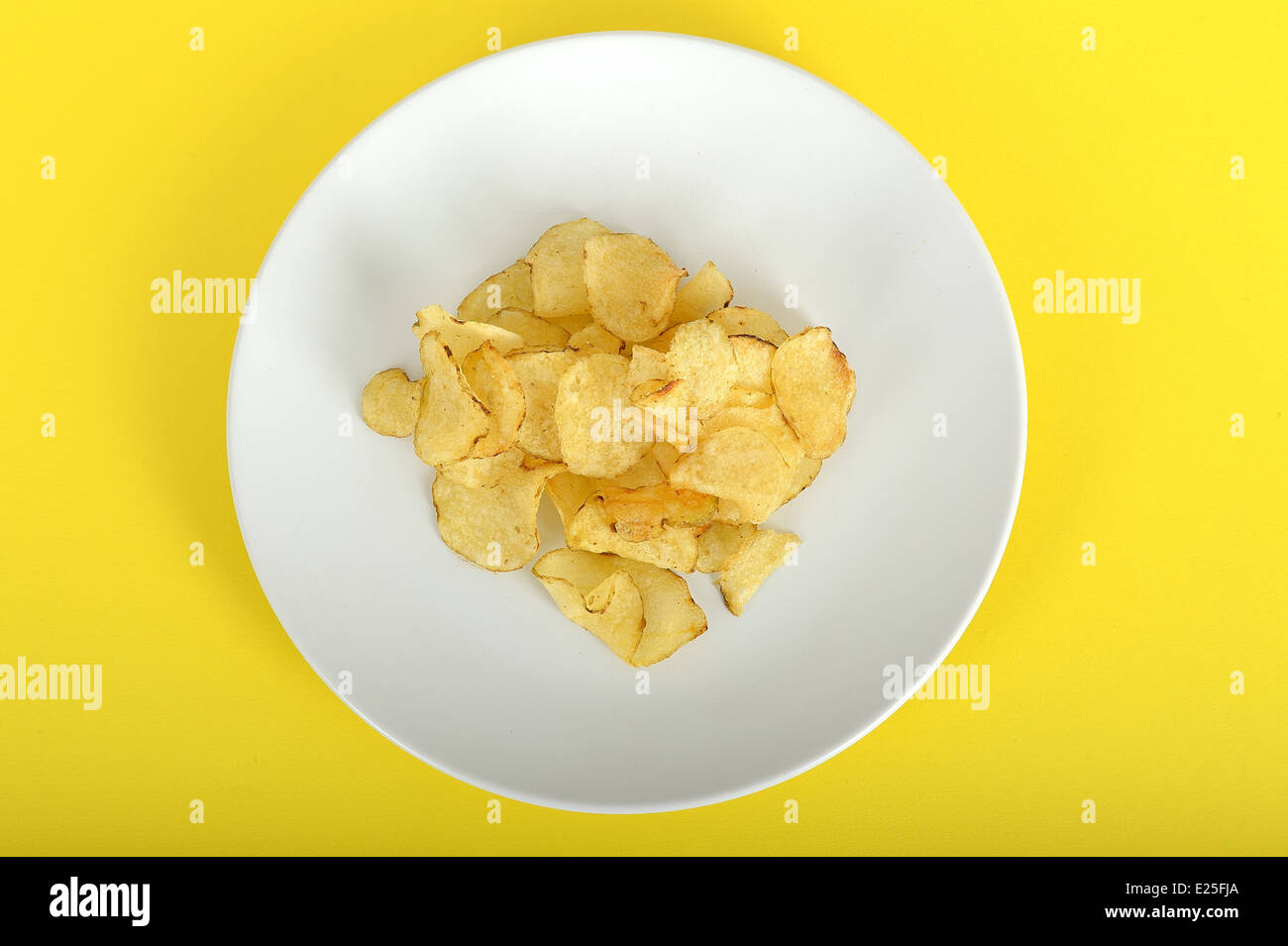Handful of Potato Crisps Providing 100 Calories Stock Photo Alamy