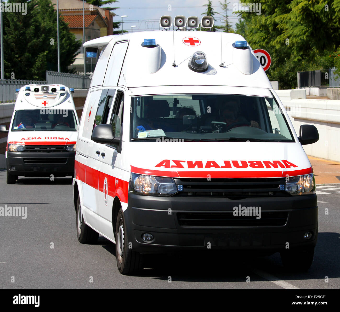 Two italian ambulances in the street run fast to the place of accident Stock Photo