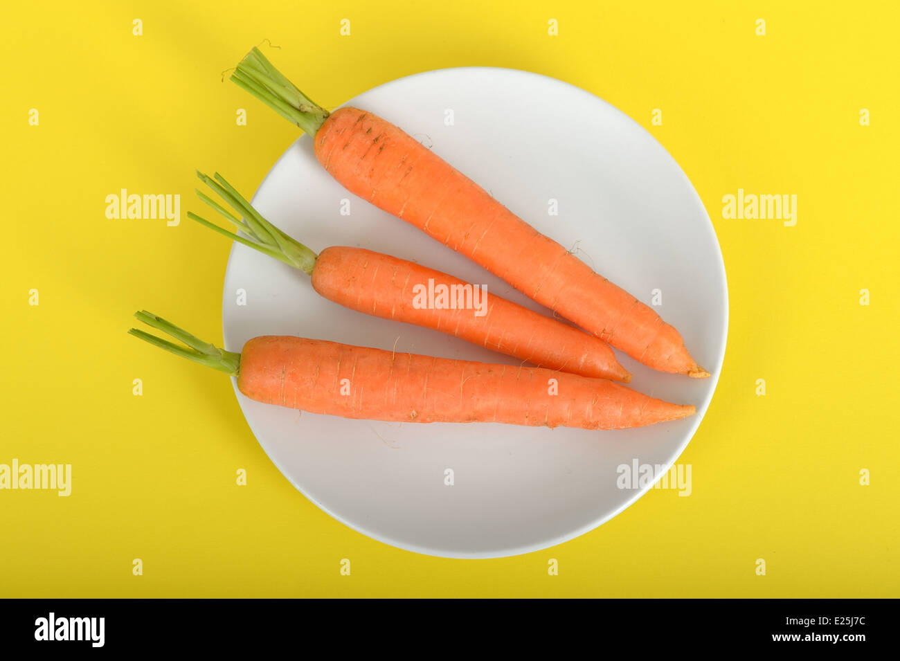 Three Raw Carrots Providing 100 Calories Stock Photo Alamy