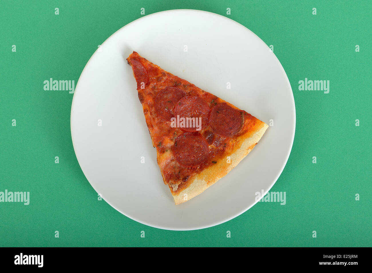 Slice of Pepperoni Pizza Providing 100 Calories Stock Photo
