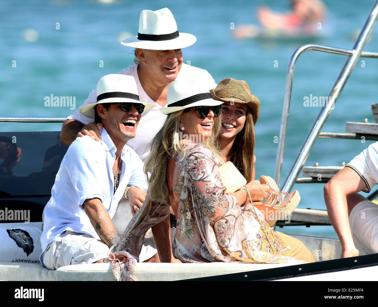 Celebrities at Club 55 in St Tropez  Featuring: Chloe Green,Marc Anthony,Sir Philip Green,Tina Green Where: St Tropez, France When: 06 Jul 2013 Stock Photo