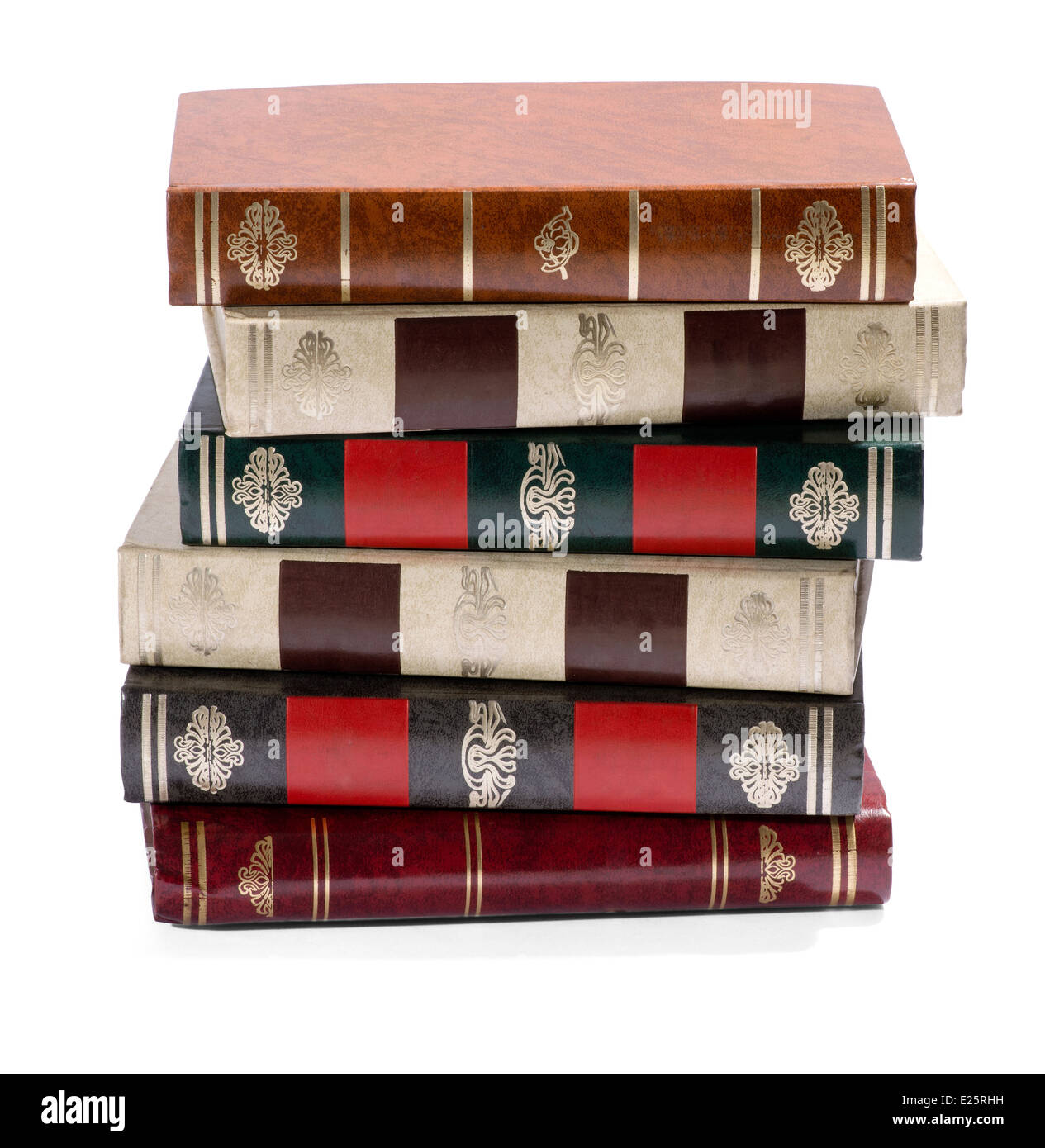 Stack of old books with gilt tooled spines Stock Photo