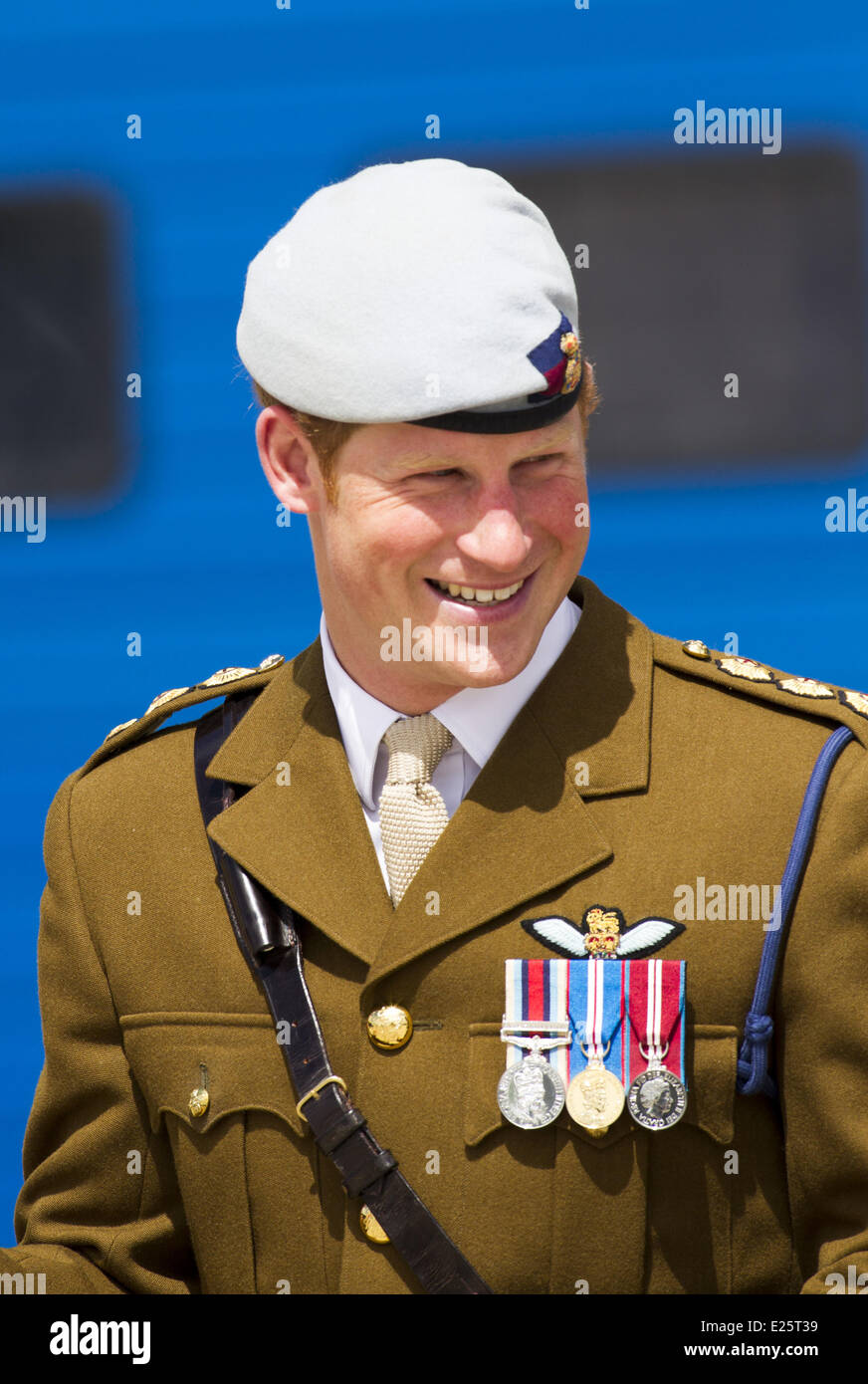 Britain's Prince Harry, Commodore-in-Chief Small Ships and Diving, visits the Royal Marines Tamar, HM Naval Base in Devonport, Plymouth. The Prince officially opened the Royal Navy's newly built centre of amphibious excellence. During the tour, Prince Harry took the parade salute, and reviewed the guard and parade of 1 Assault Squadron Royal Marines. He also attended a reception for the military personnel and their families, and joined for a unit photograph with 1 Assault Group Royal Marines  Featuring: Prince Harry of Wales Where: Plymouth, United Kingdom When: 02 Aug 2013 Stock Photo
