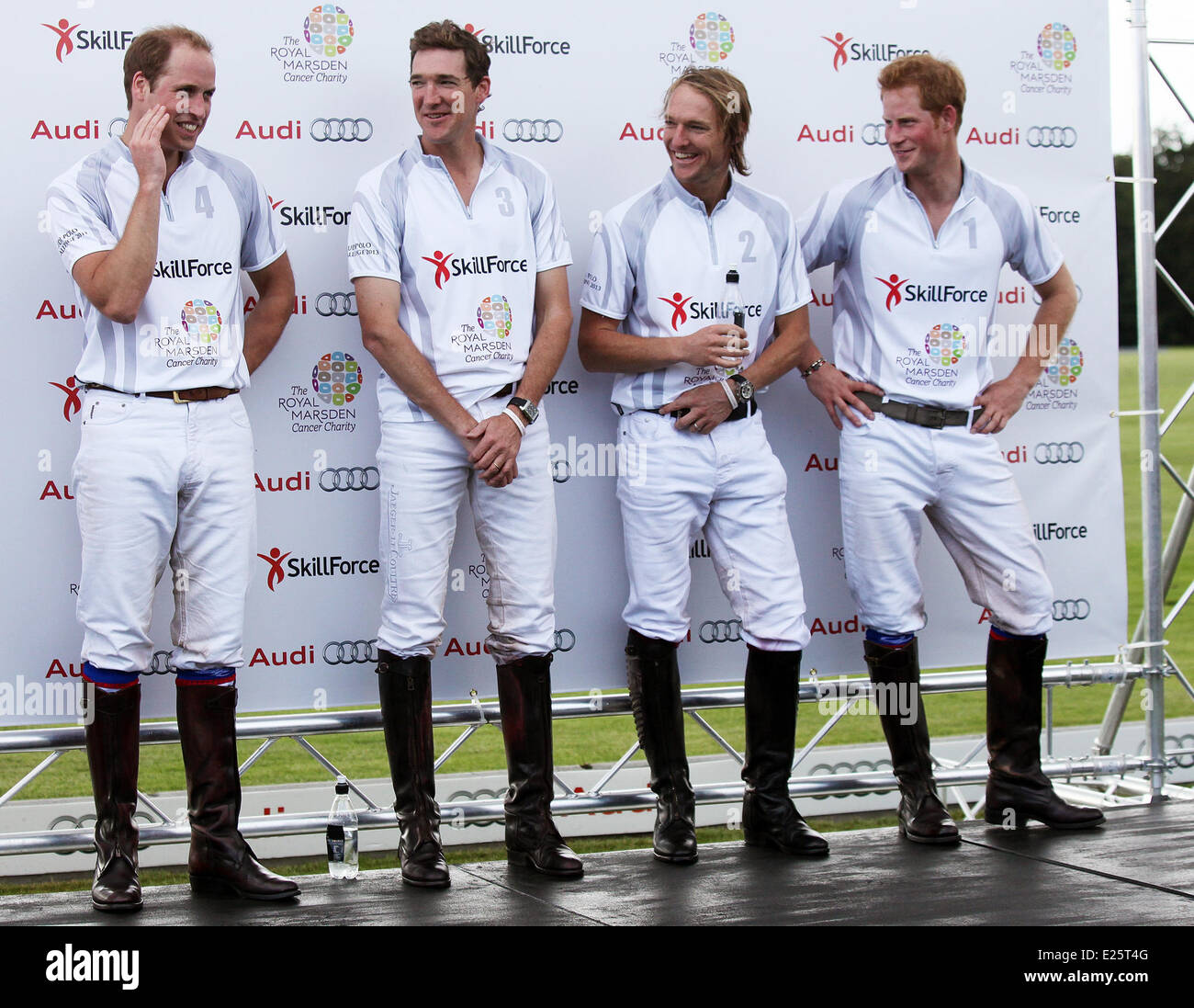Britain's Prince WIlliam and Prince Harry play a charity polo match at the Audi Polo Challenge, Coworth Park, Berkshire, The match is in aid of the charities SkillForce and The Royal Marsden Cancer Charity, of which The Duke of Cambridge is Patron and President respectively.  Featuring: Prince WIlliam,Prince Harry Where: Windsor, Royaume Uni When: 03 Aug 2013 Stock Photo