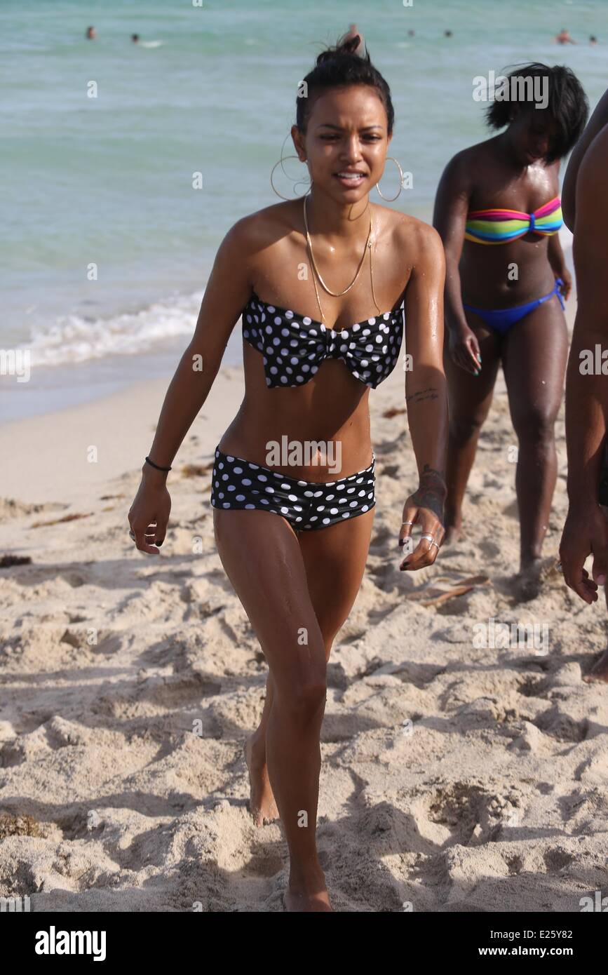 Karrueche Tran wearing a polka dot bikini with a pink bow on her rear,  enjoys the beaches in Miami Featuring: Karrueche Tran Where: Miami Beach,  Florida, United States When: 22 Sep 2013