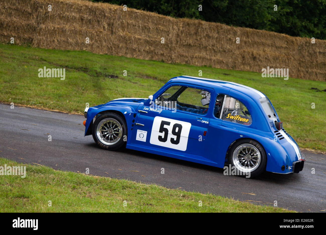 1978 70s seventies Blue White Fiat 500 Special saloon with mini 1380cc engine & bespoke tubular chassis. Touring car driven by Ian Metcalf at the Cholmondeley Pageant of Power. The action is at the 1.2-mile track within the park grounds of Cholmondeley Castle where over 120  isolated cars compete, spanning seven decades of motorsports. Stock Photo