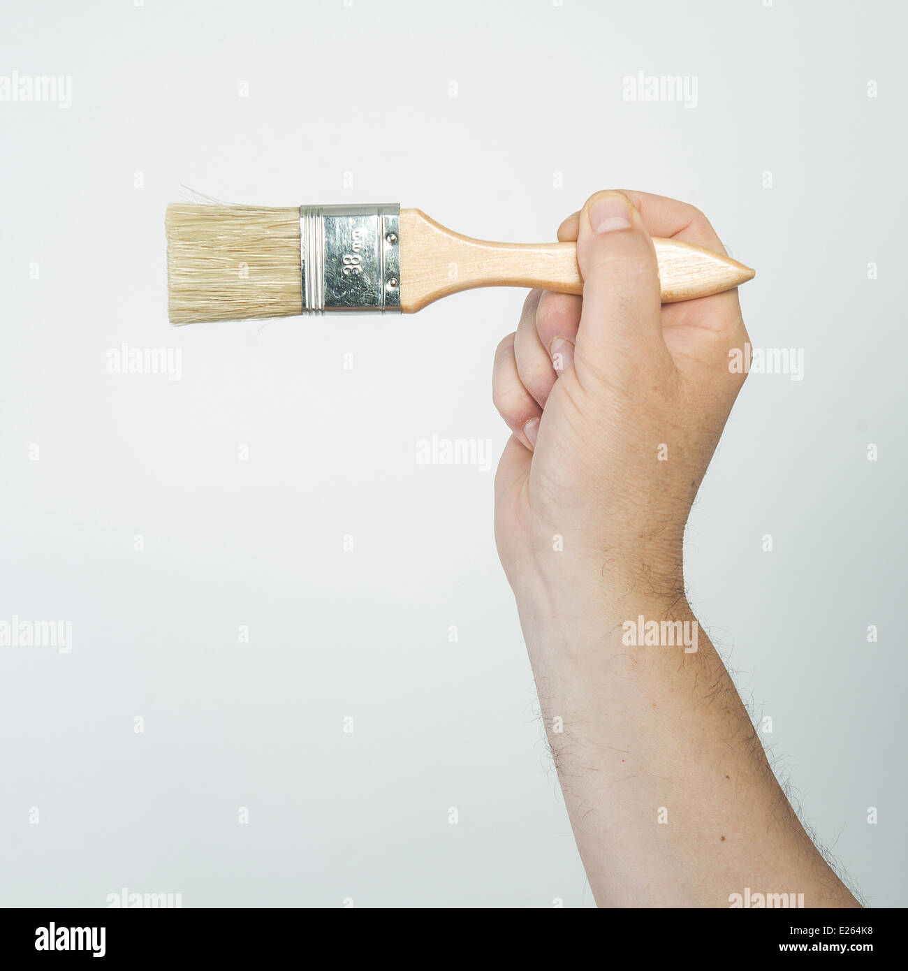 paint brush on hand Stock Photo