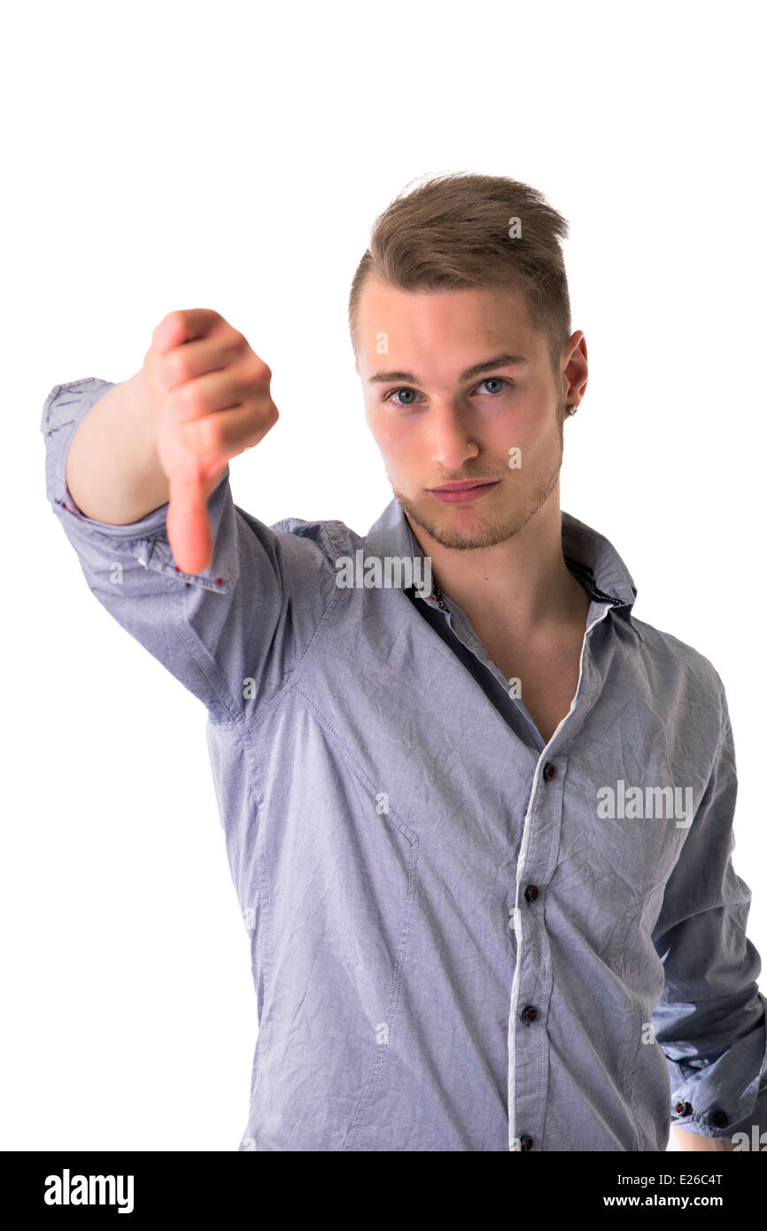 Handsome blond young man doing thumb down sign, isolated on white Stock ...