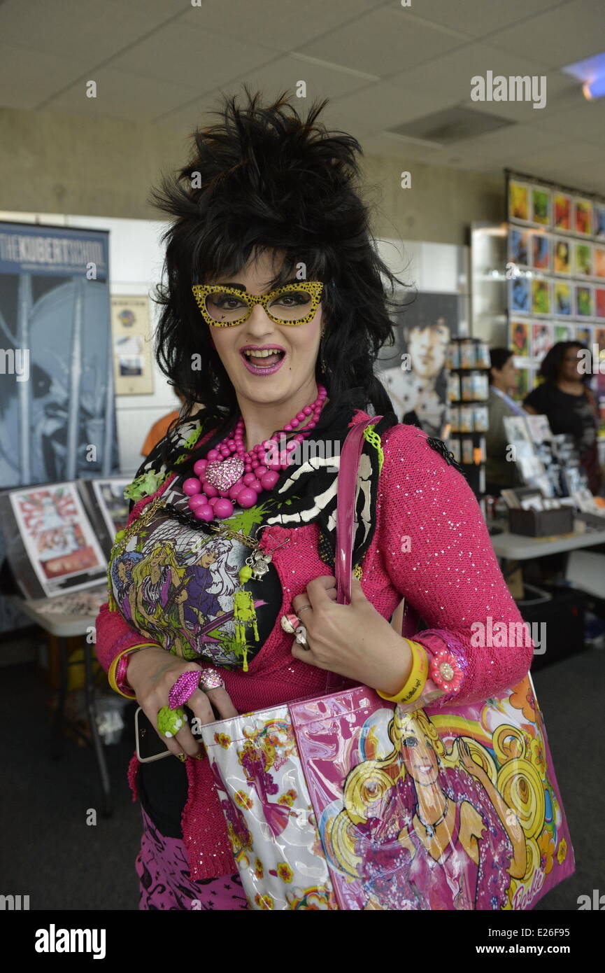 Garden City, New York, USA. 14th June, 2014. LINDSAY LOWE, the Pennsylvania TV personality of PA LIVE, cartoon fashions, wears colorful sunglasses and outfit at Eternal Con, the annual Pop Culture Expo, held at the Cradle of Aviation Museum on Long Island. Credit:  Ann E Parry/Alamy Live News Stock Photo
