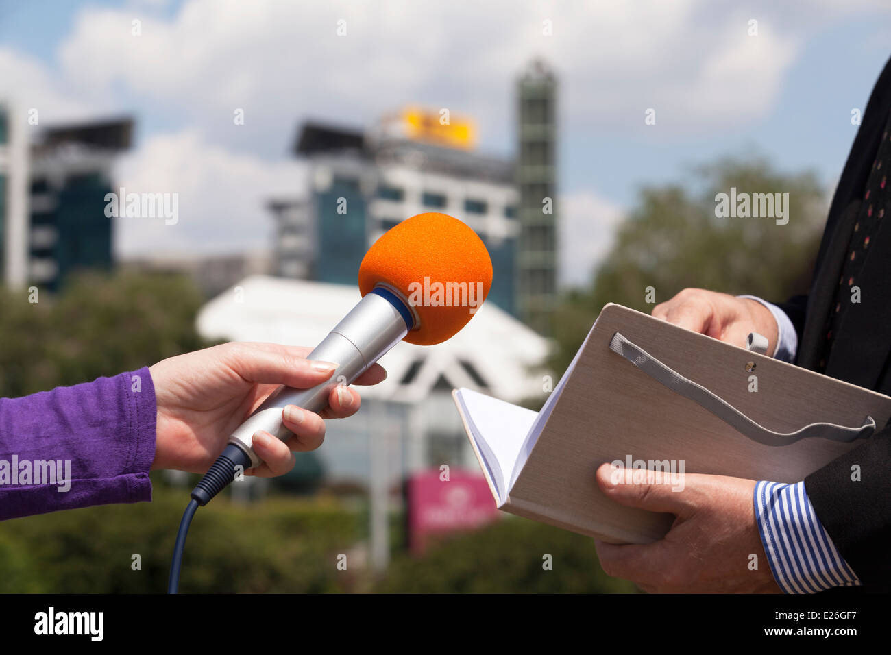 Interview with press hi-res stock photography and images - Alamy