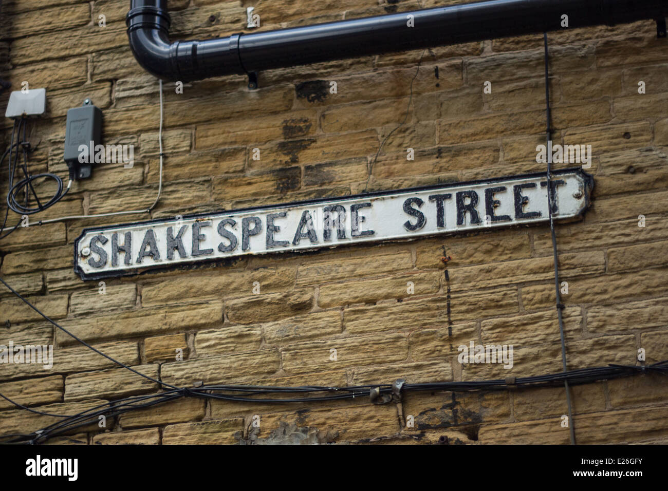 A road sign for Shakespeare Street in Halifax. On local stone wall