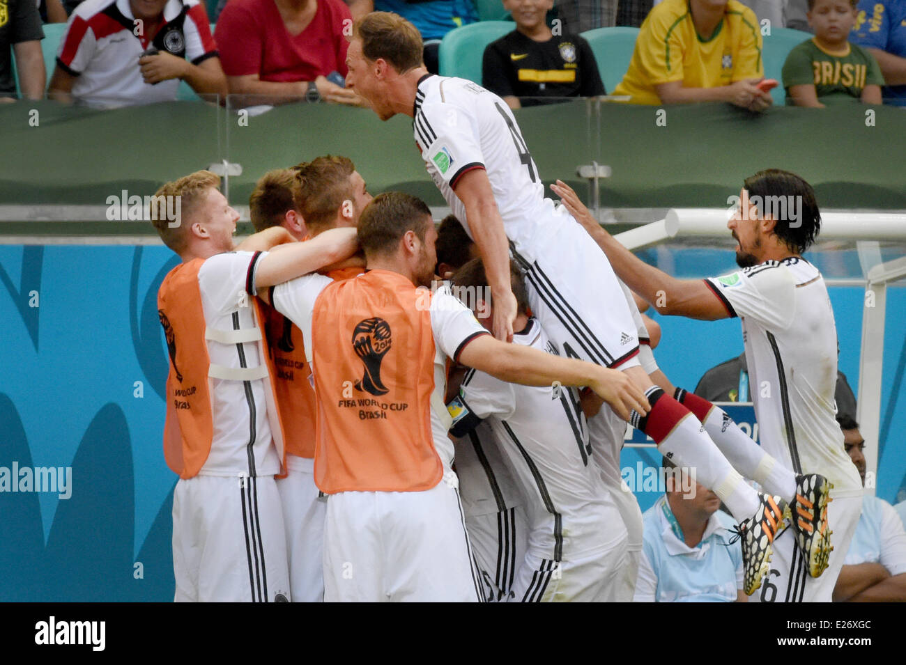 Salvador da Bahia, Brazil. 16th June, 2014. Salvador da Bahia, Brazil.  16th June, 2014. Germany's substitute players celebrate with Benedikt Höwedes (up) and Sami Khedira (R) afteroeMats Hummels (not seen) scored the 2-0 during to the FIFA World Cup 2014 group G preliminary round match between Germany and Portugal at the Arena Fonte Nova Stadium in Salvador da Bahia, Brazil, 16 June 2014. Photo: Marcus Brandt/dpa/Alamy Live News Credit:  dpa picture alliance/Alamy Live News Stock Photo