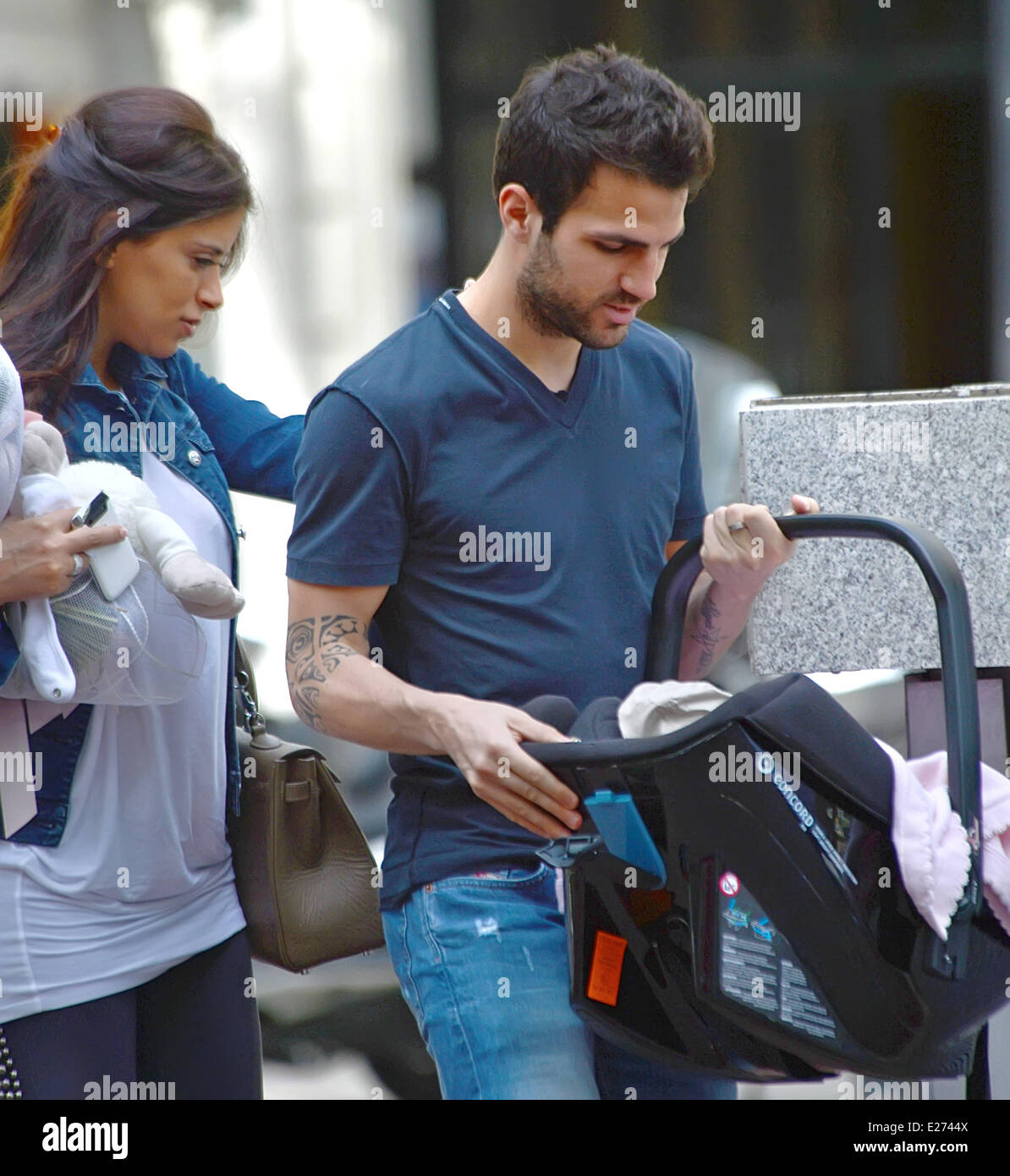 cesc-fabregas-and-girlfriend-daniella-semaan-walking-with-their-newborn
