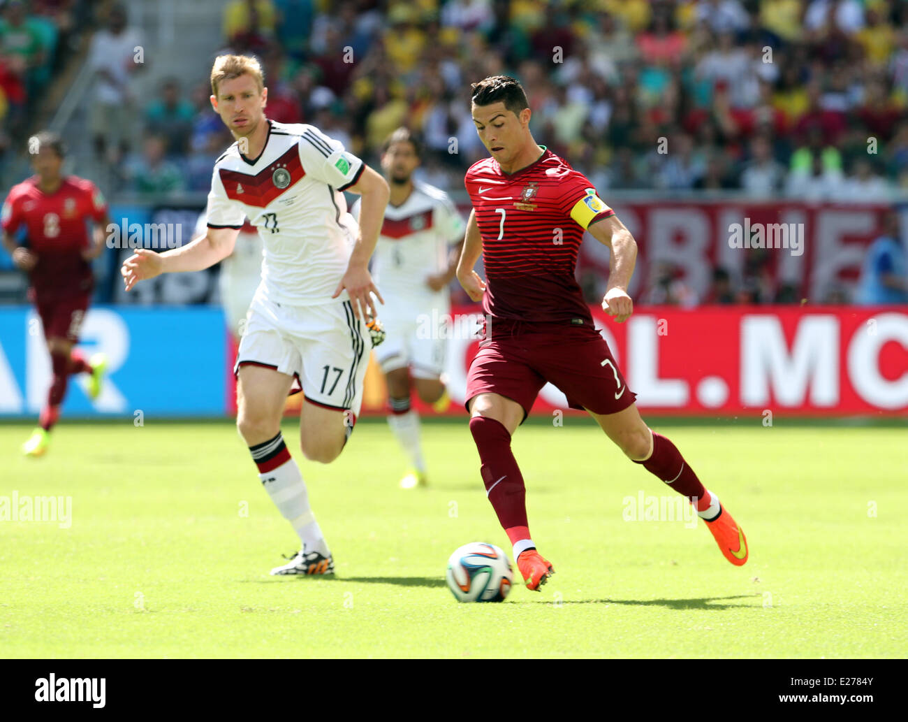 Savador, Brazil. 16th June, 2014. World Cup finals 2014. Germany versus Portugal. Cristiano Ronaldo and Mertesacker Credit:  Action Plus Sports/Alamy Live News Stock Photo