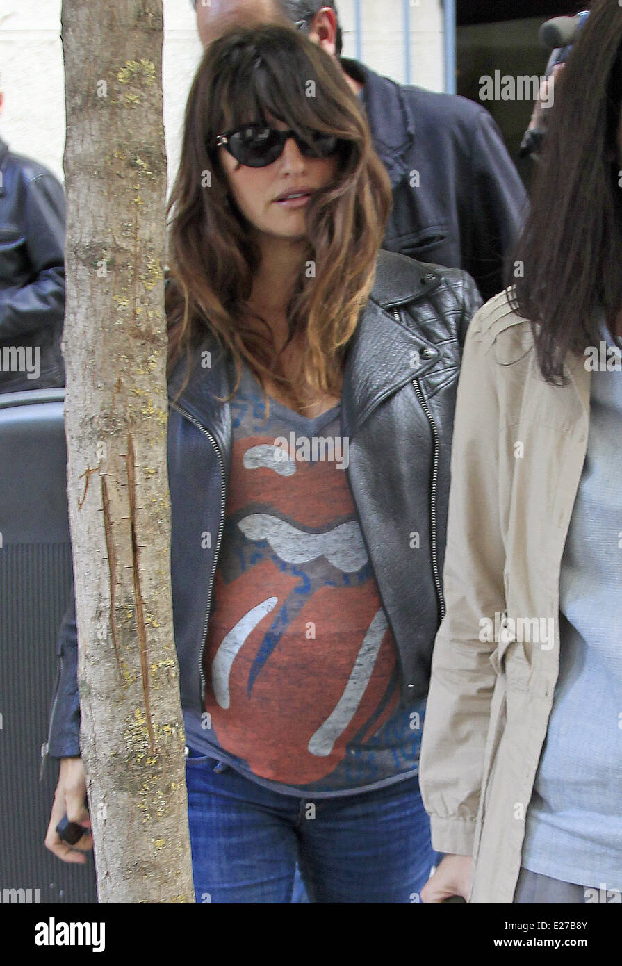 Pregnant Penelope Cruz shows off her baby bump while out and about in