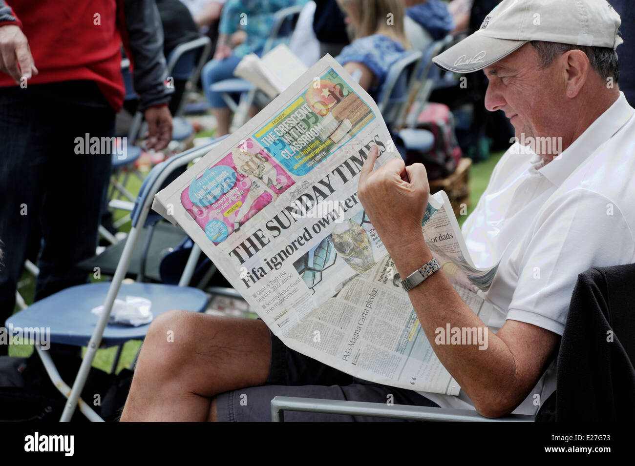 Man reading the Sunday Times newspaper Stock Photo Alamy
