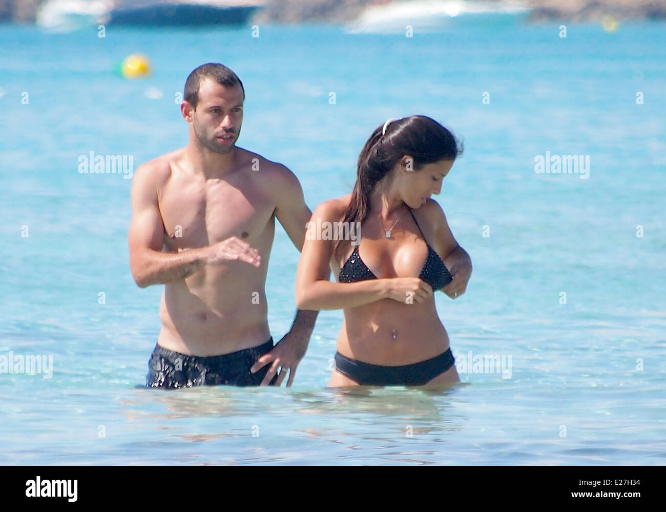 FC Barcelona midfielder Javier Mascherano spends time at the beach with his  wife and children while on holiday in Formentera Featuring: Javier  Mascherano,Fernanda Mascherano Where: Formentera, Balearic Islands, Spain  When: 22 Jun