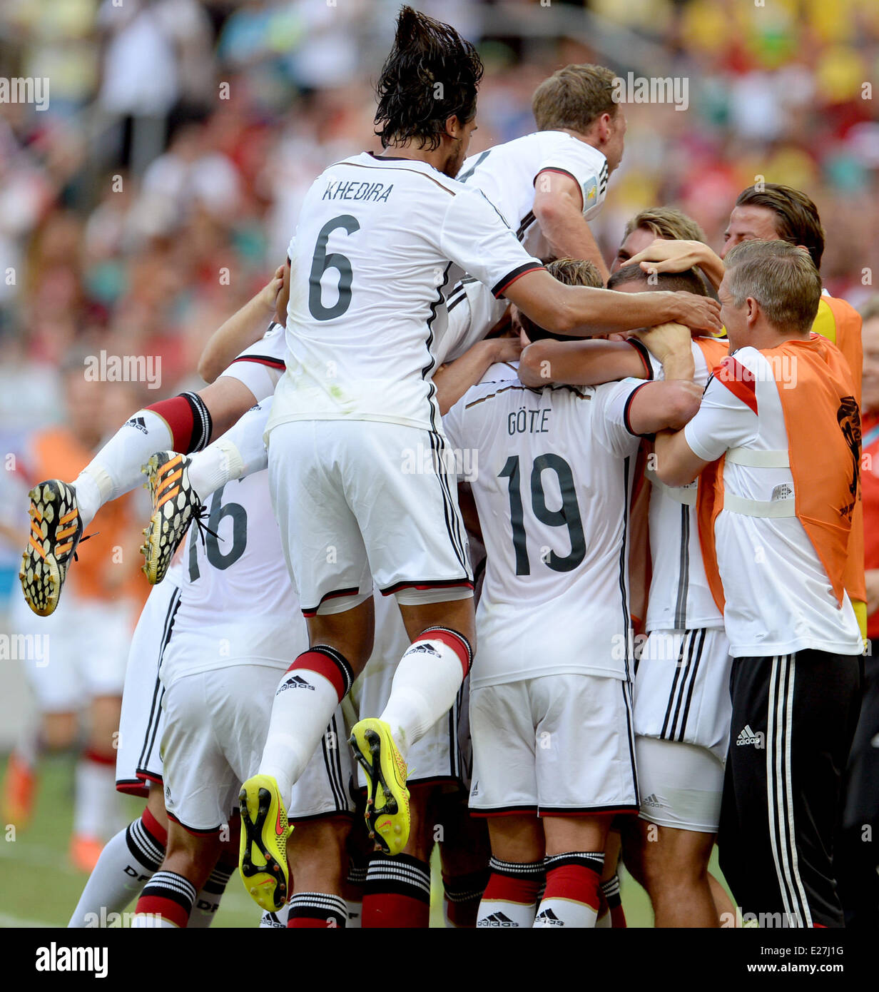 Salvador da Bahia, Brazil. 16th June, 2014. Salvador da Bahia, Brazil.  16th June, 2014. Germany's players (L-R) Philipp Lahm, Sami Khedira, Benedikt Höwedes, Mario Götze and Bastian Schweinsteiger celebrate after Mats Hummels (not seen) scored the 2-0 during the FIFA World Cup 2014 group G preliminary round match between Germany and Portugal at the Arena Fonte Nova Stadium in Salvador da Bahia, Brazil, 16 June 2014. Credit:  dpa picture alliance/Alamy Live News Stock Photo