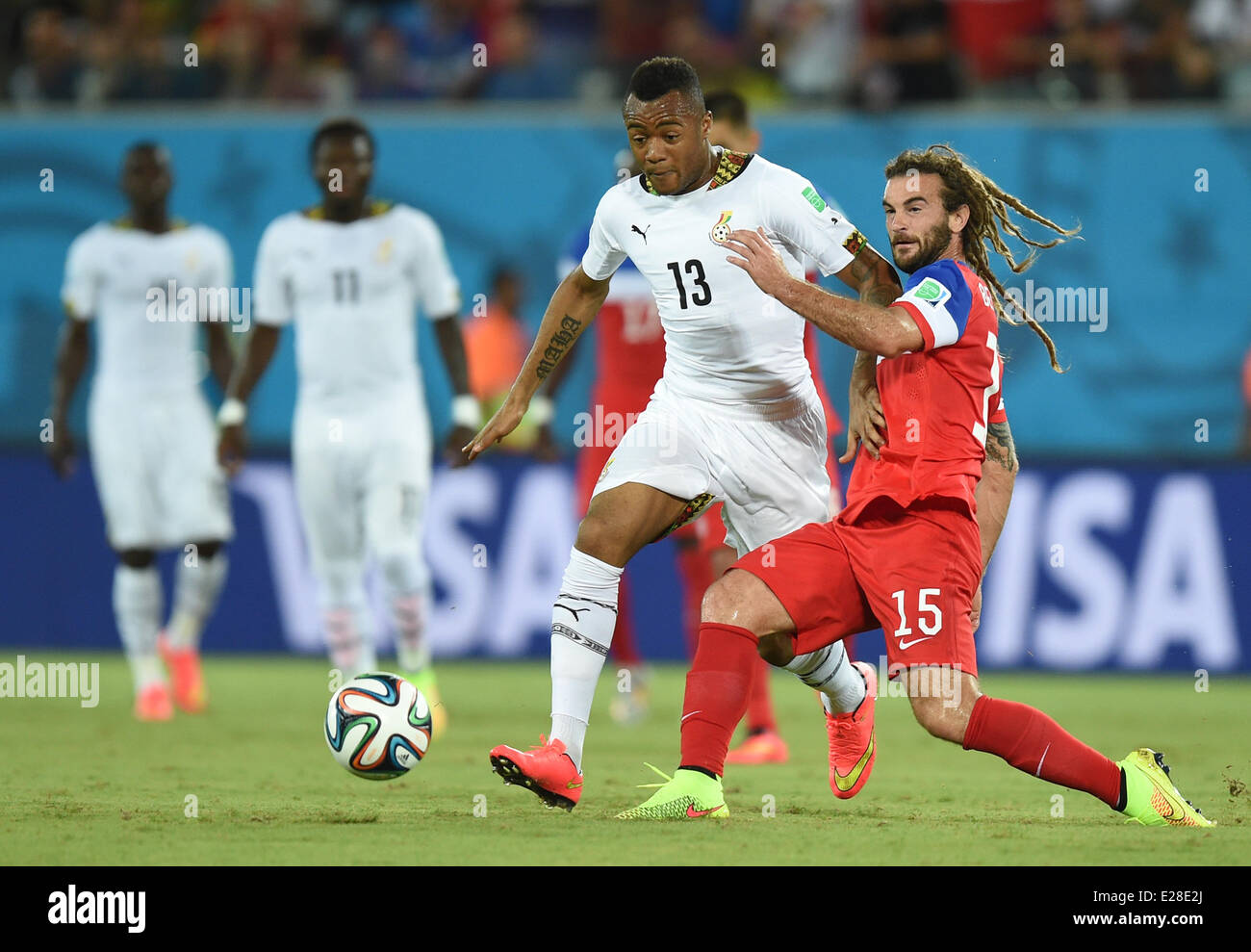 Natal, Brazil. 16th June, 2014. Kyle Beckerman (R) of USA in action against Jordan Ayew of Ghana during the FIFA World Cup 2014 group G preliminary round match between Ghana and the USA at the Estadio Arena das Dunas Stadium in Natal, Brazil, 16 June 2014. Credit:  dpa picture alliance/Alamy Live News Stock Photo