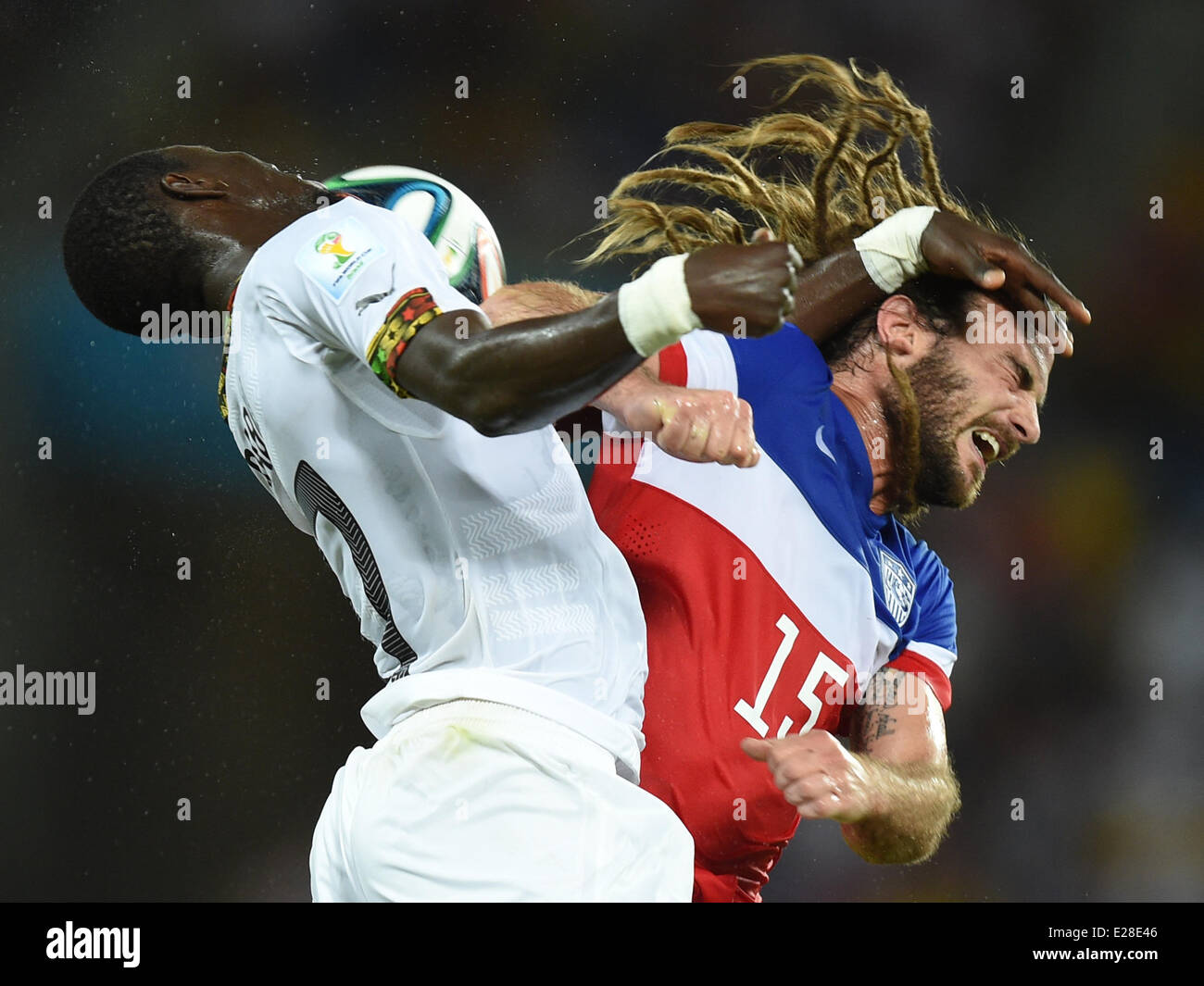 Natal, Brazil. 16th June, 2014. Mohammed Rabiu (L) of Ghana in action against Kyle Beckerman of USA during the FIFA World Cup 2014 group G preliminary round match between Ghana and the USA at the Estadio Arena das Dunas Stadium in Natal, Brazil, 16 June 2014. Credit:  dpa picture alliance/Alamy Live News Stock Photo