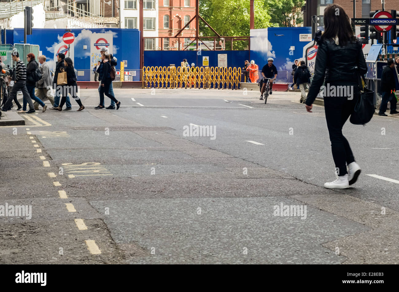 Pedestrians Crossing the road at Tottenham court road, London, UK Stock Photo